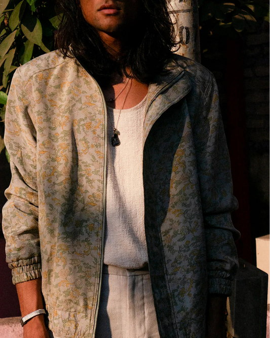 AKSA Bomber II is our printed silk bomber jacket, handcrafted by skilled artisans in-house using two one-of-a-kind vintage silk saree.