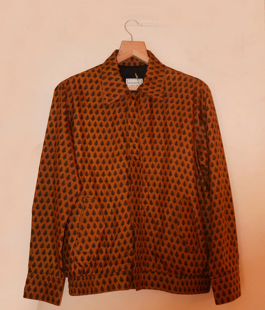 AKSA BOMBER IV is our one-of-a-kind reversible bomber jacket, handcrafted in-house using two vintage silk sarees.