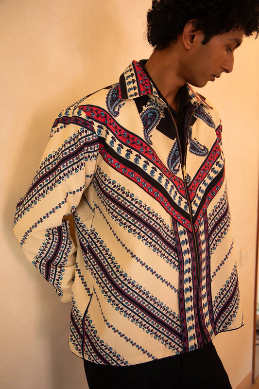 Aksa Bomber IV is our one-of-a-kind printed silk bomber jacket, handcrafted by skilled artisans in-house using a one-of-a-kind vintage silk saree.