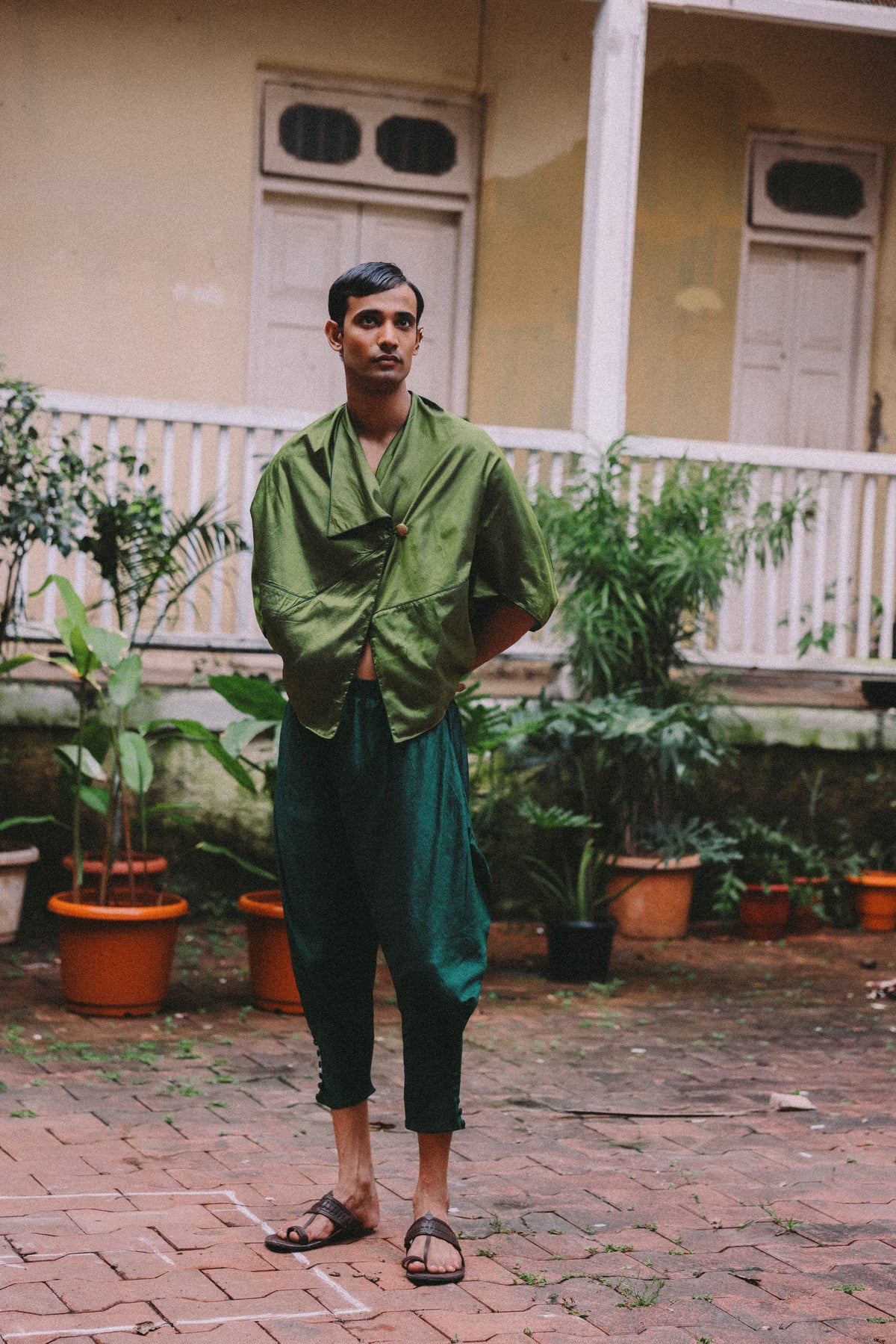 PATANG TOP is our one-of-a-kind top, handcrafted in-house from a single square of fabric, folded seamlessly into form without any cuts or waste.