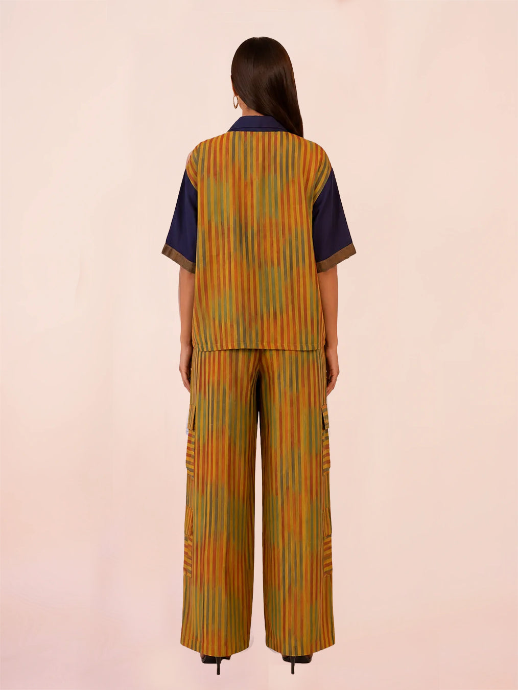 RAGA XII PANT SET is our one of a kind printed silk shirt and pant set, handcrafted by skilled artisans in house using a vintage silk saree.