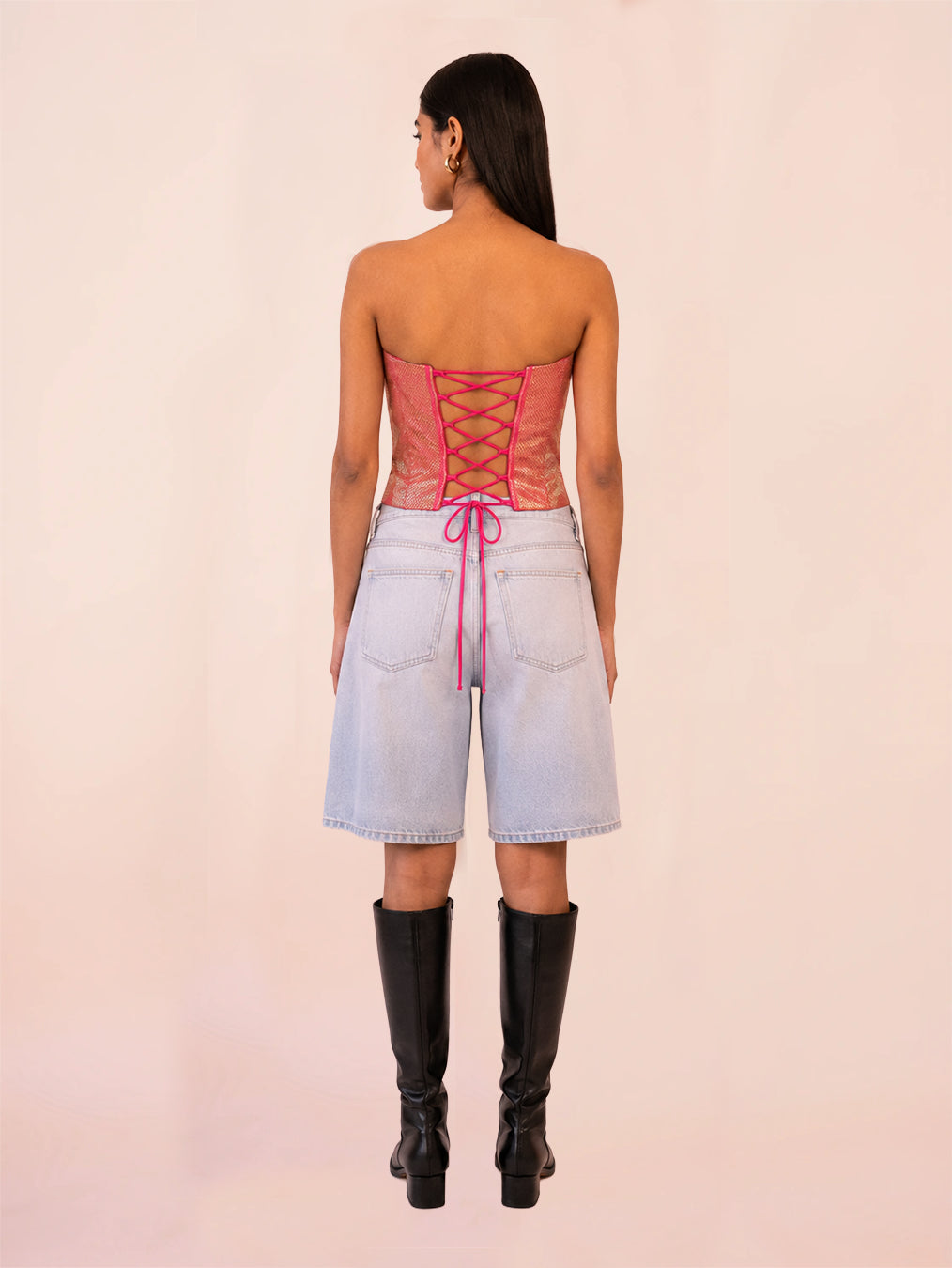 RAINA is our one-of-a-kind four-panel corset, handcrafted in-house using a vintage silk saree.