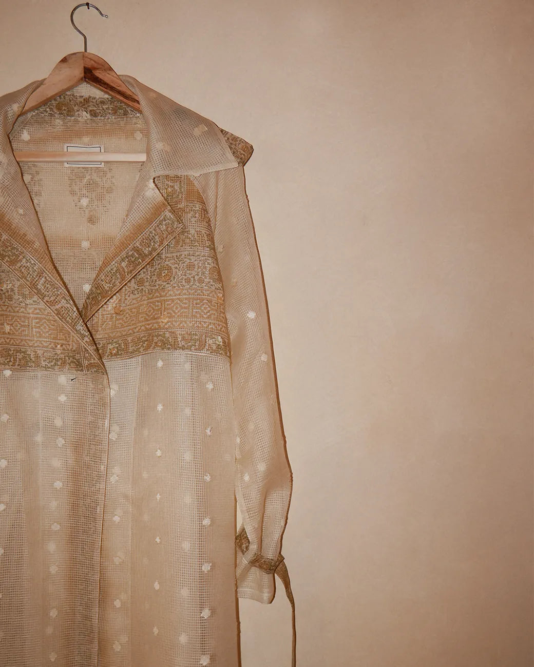 Vedyawhite checkered silk trench coat handcrafted from silk with relaxed boxy fit, buckle details on arms and waist