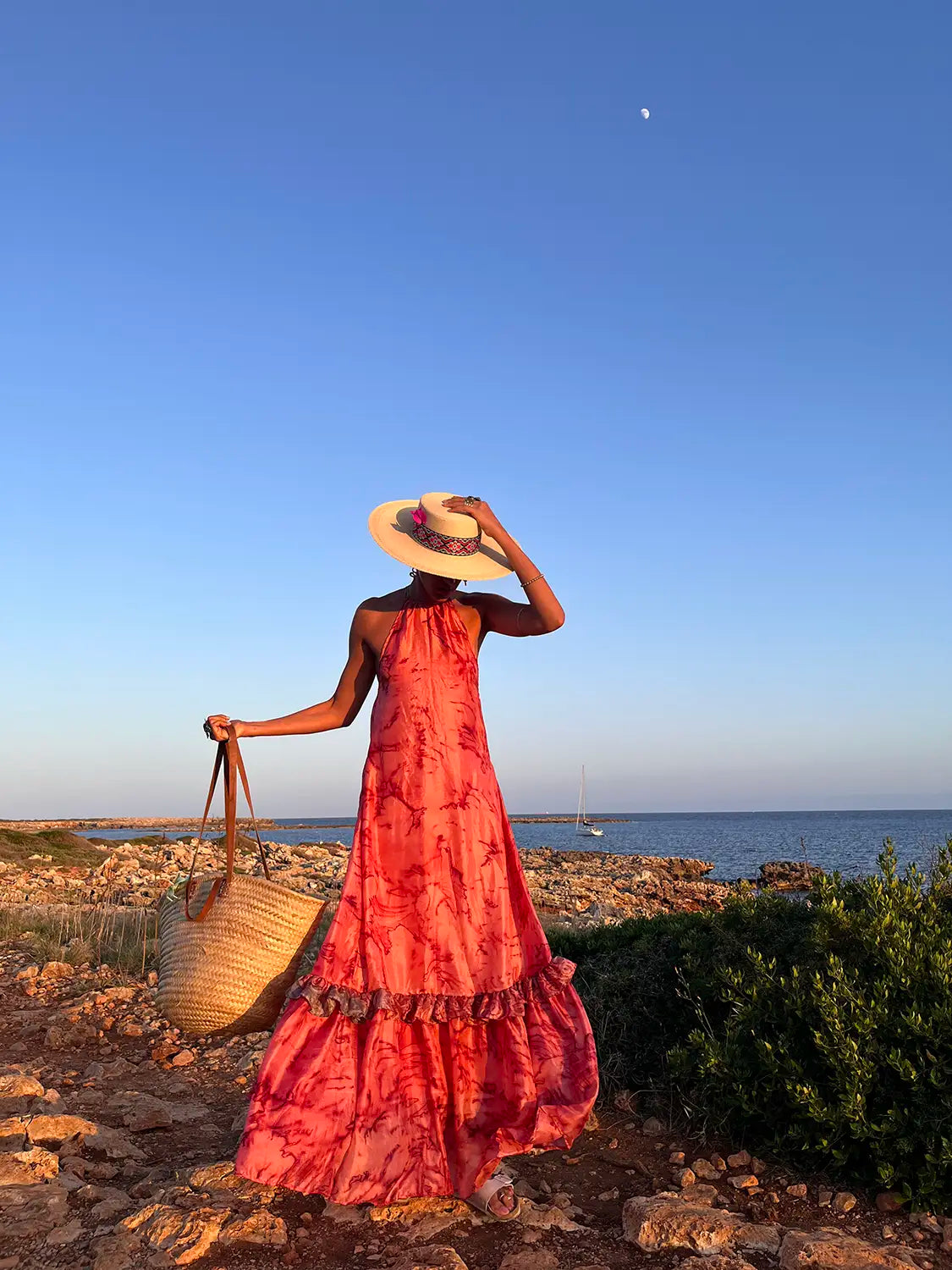 YAMI II is our one-of-a-kind halter neck backless dress, handcrafted using a beautiful printed vintage silk saree.