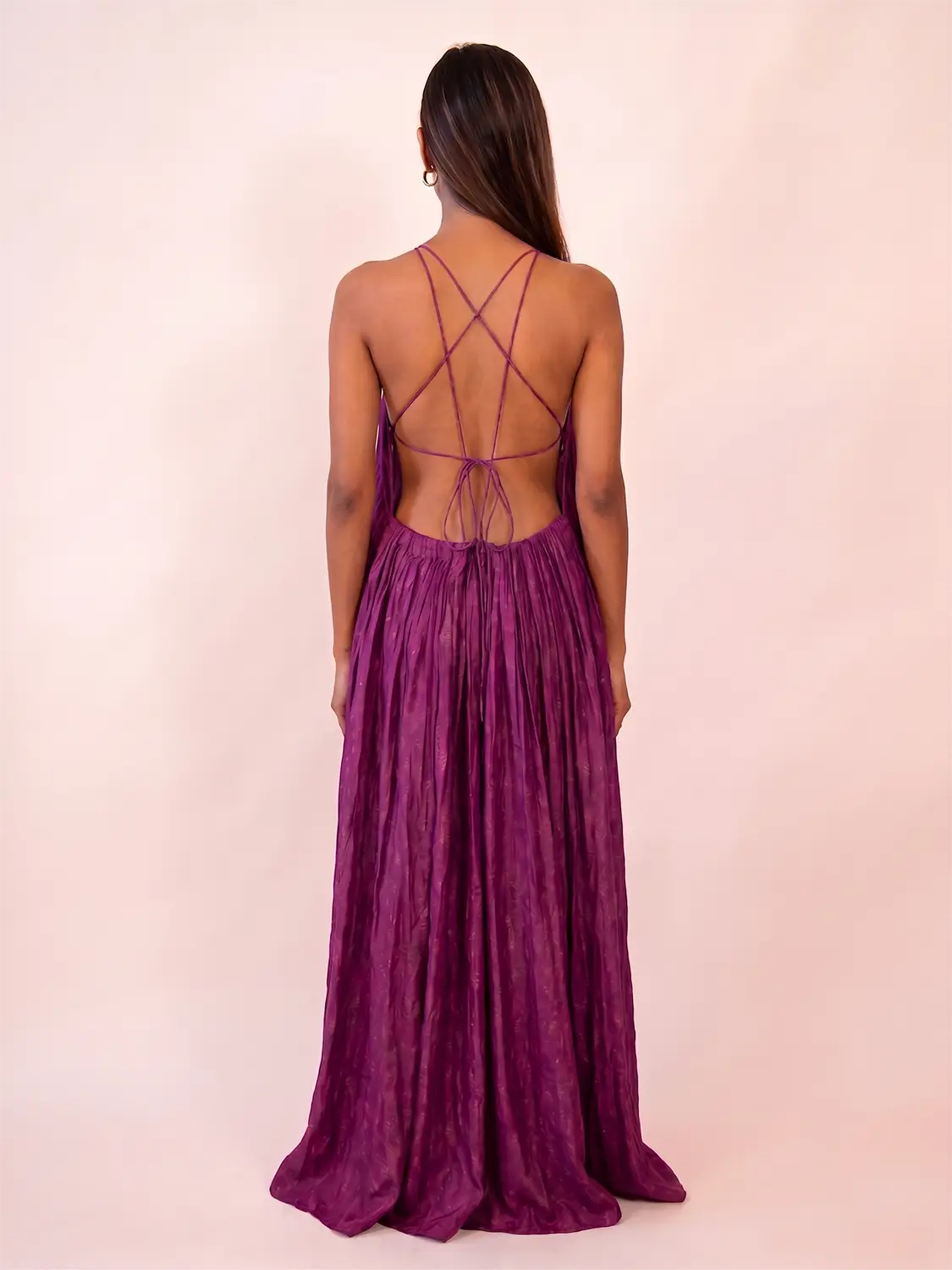 SAHIBA is our one-of-a-kind deep V backless dori dress, handcrafted by skilled artisans in-house using a one-of-a-kind vintage silk saree.
