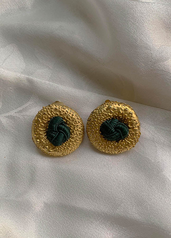 Vintage gold clip-on earrings with central fabric knot detail, handpicked in Paris.