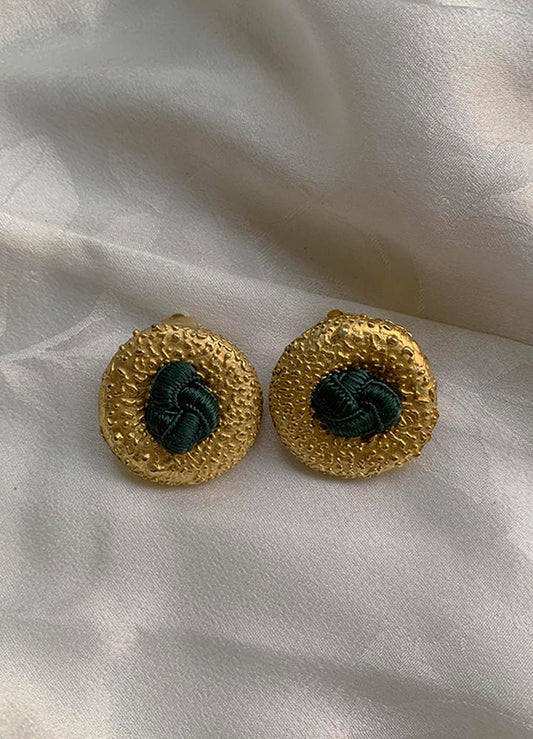 Vintage gold clip-on earrings with central fabric knot detail, handpicked in Paris.