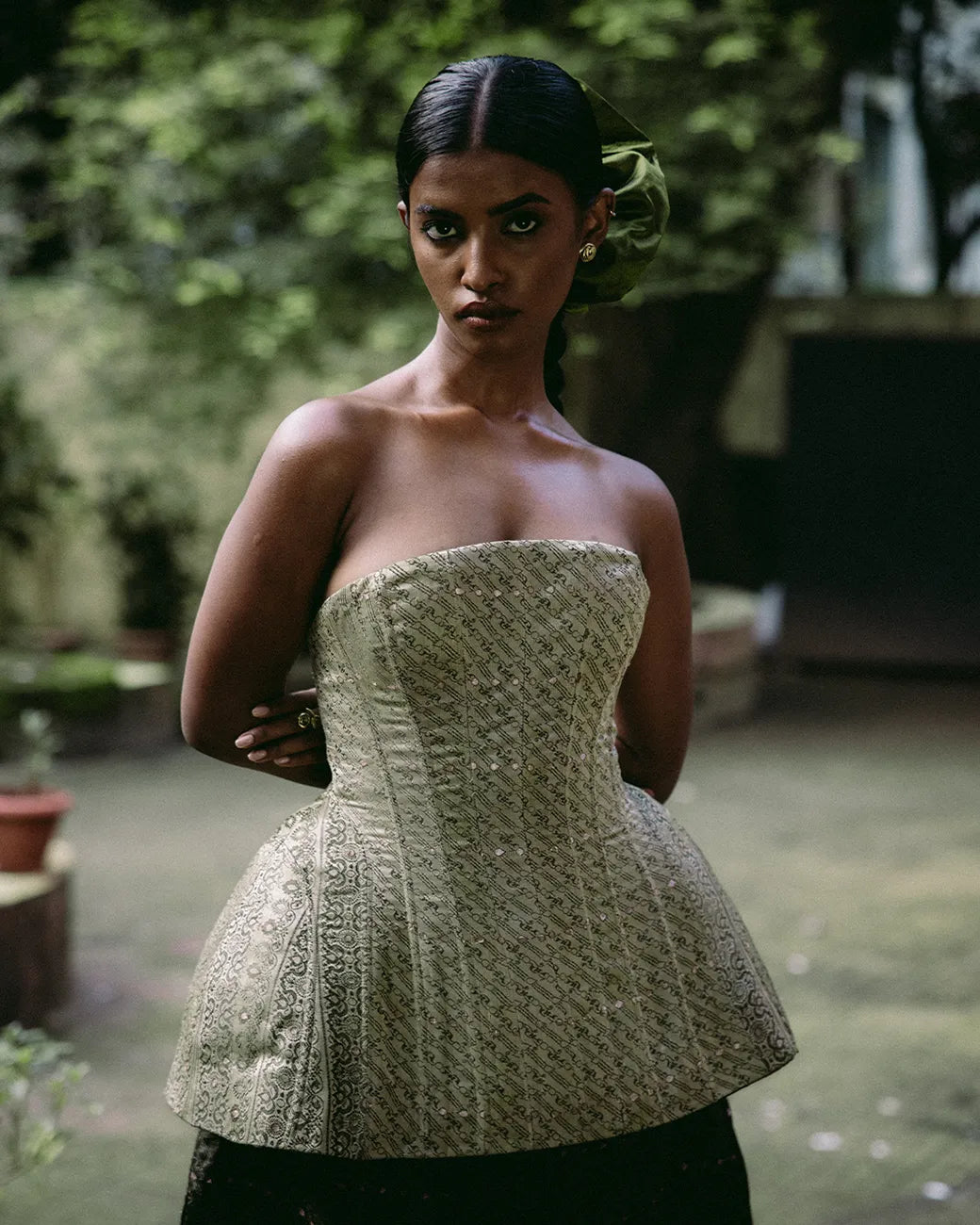 Aisha Corset with sculpted hem and laced back paired with Chandshalwar balloon pants featuring dhoti-style folds.