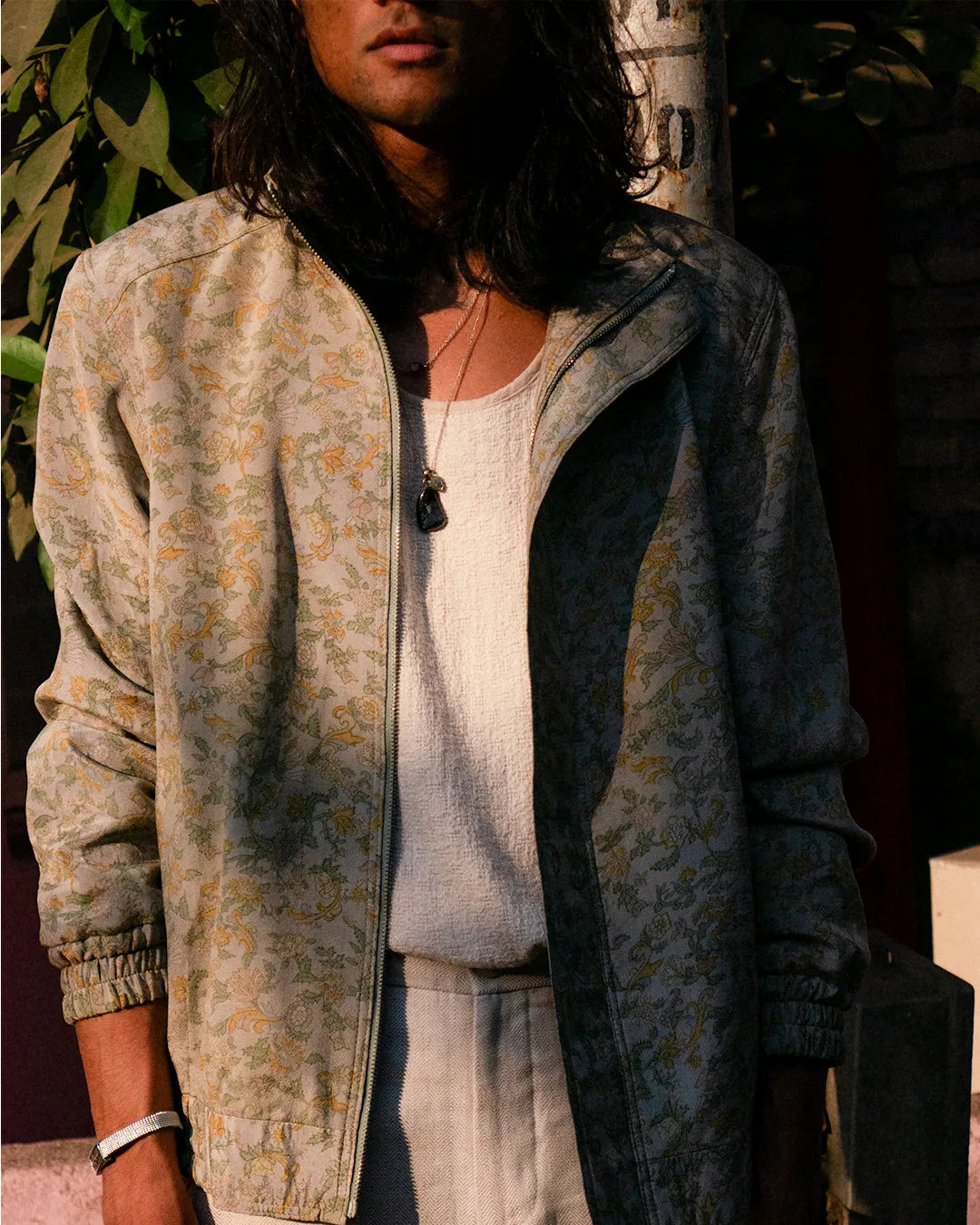 AKSA Bomber II is our printed silk bomber jacket, handcrafted by skilled artisans in-house using two one-of-a-kind vintage silk saree. 