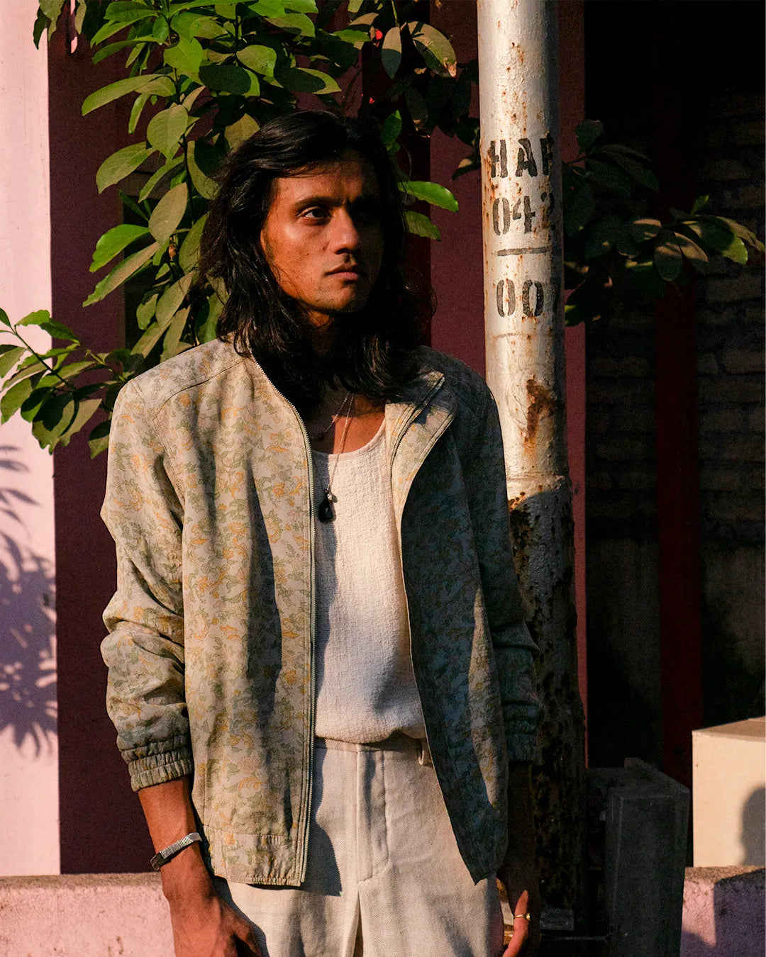 AKSA Bomber II is our printed silk bomber jacket, handcrafted by skilled artisans in-house using two one-of-a-kind vintage silk saree. 