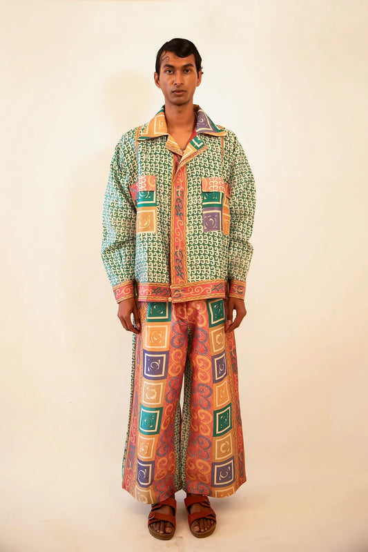 Aksa Bomber III and Wide Pant Set is our one-of-a-kind printed silk set, handcrafted by skilled artisans in-house using a one-of-a-kind vintage silk saree. 