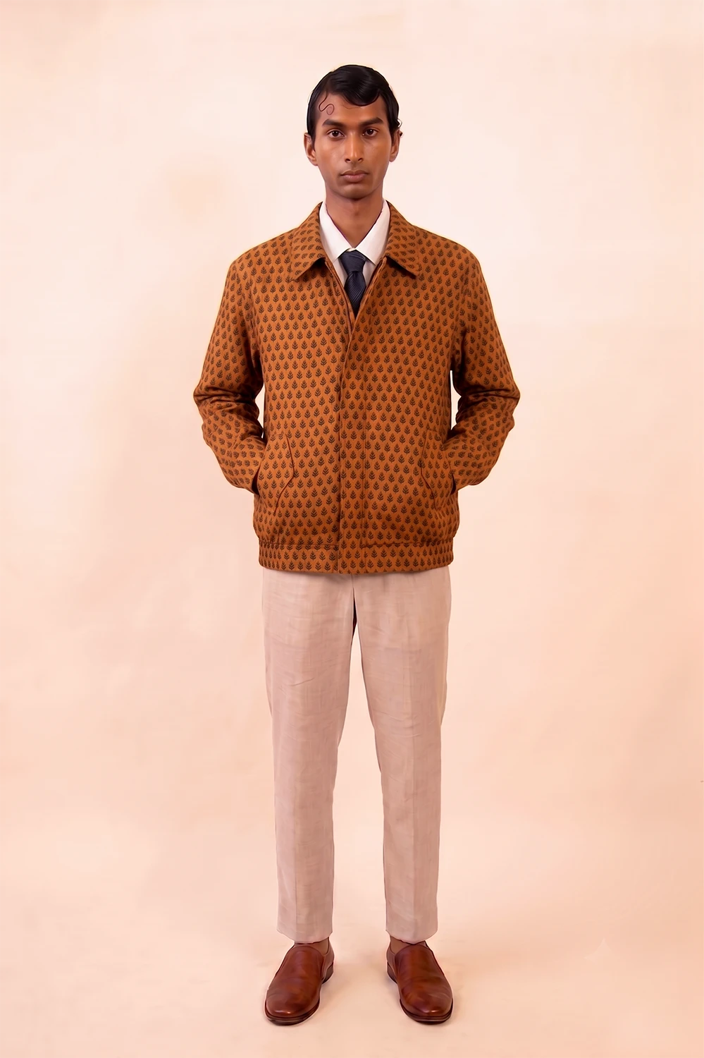 AKSA BOMBER IV is our one-of-a-kind reversible bomber jacket, handcrafted in-house using two vintage silk sarees.