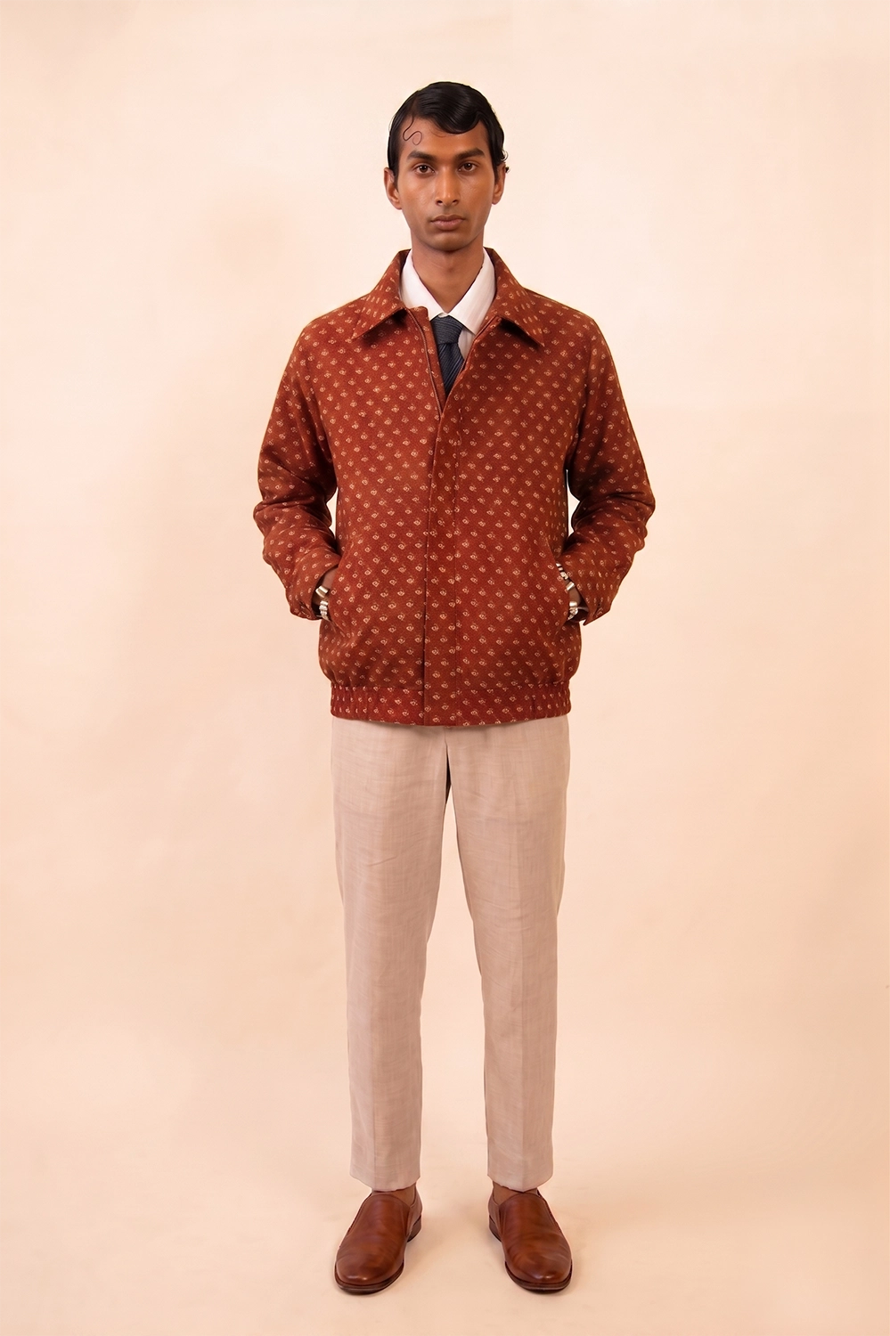 AKSA Bomber I is our printed silk bomber jacket, handcrafted by skilled artisans in-house using two one-of-a-kind vintage silk saree. 