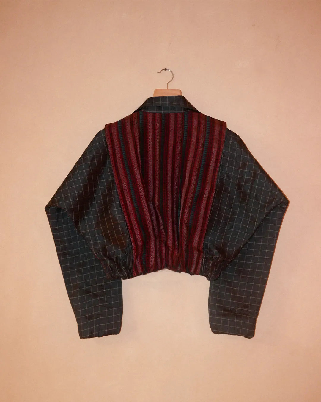 AMBR is our one-of-a-kind cropped two-toned silk brocade reversible bomber, handcrafted by skilled artisans in-house using two vintage silk saris.