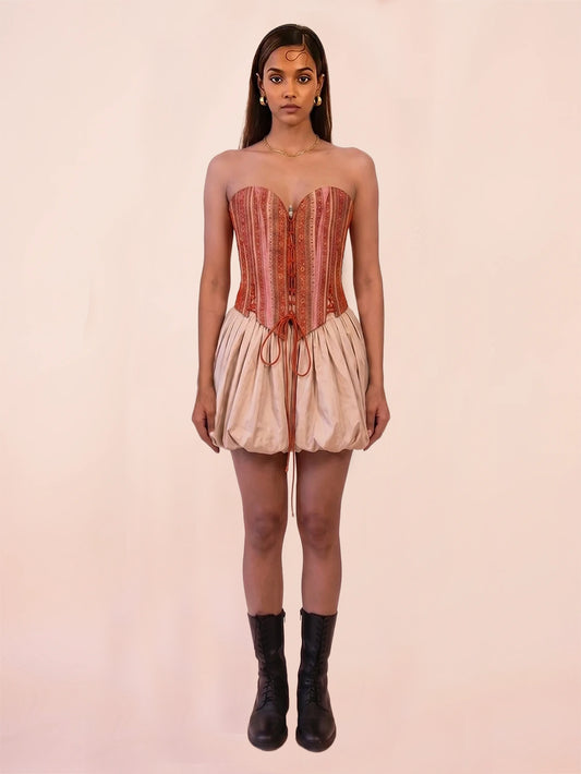 ANAI is our one-of-a-kind handcrafted corset, made in-house using a one-of-a-kind vintage silk saree. 