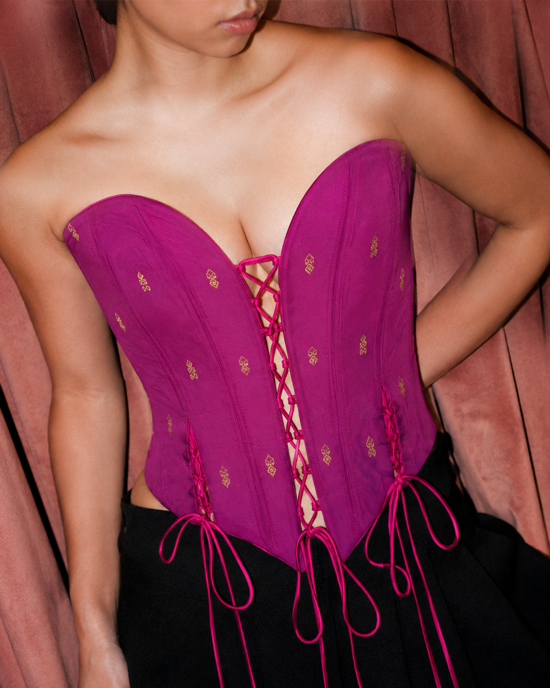 ANAI is our one-of-a-kind handcrafted corset, made in-house using a one-of-a-kind vintage silk saree. 