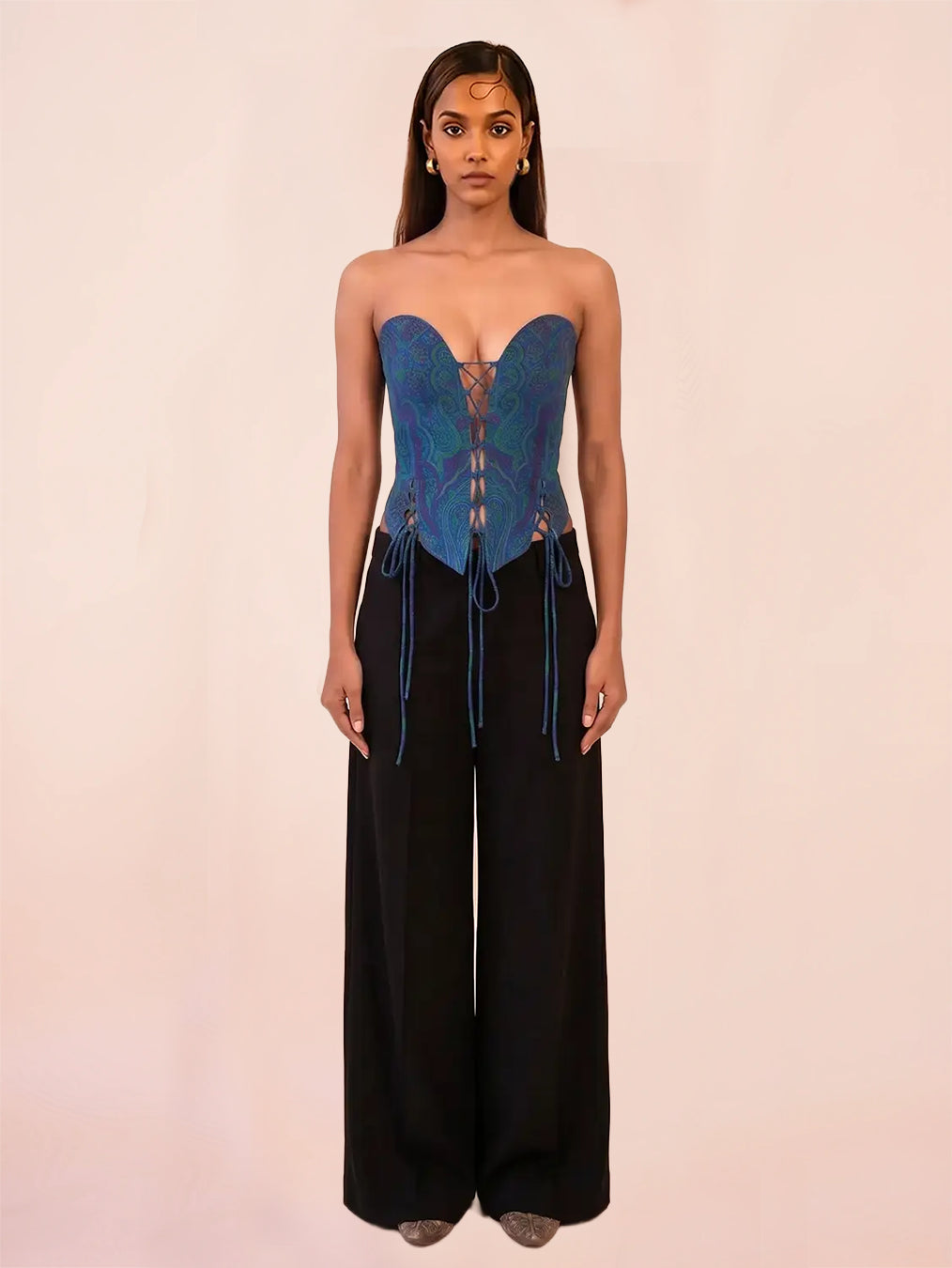 ANAI is our one-of-a-kind handcrafted corset, made in-house using a one-of-a-kind blue vintage silk saree.