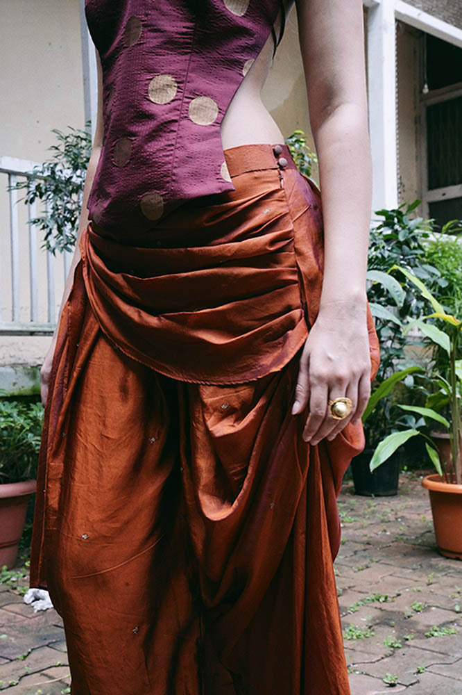 Antariya, drape pant,s , made using pre loved silk sarees, unfolds multiple drape tucks pinned at different levels, to highlight one of the most common practice of indian women.