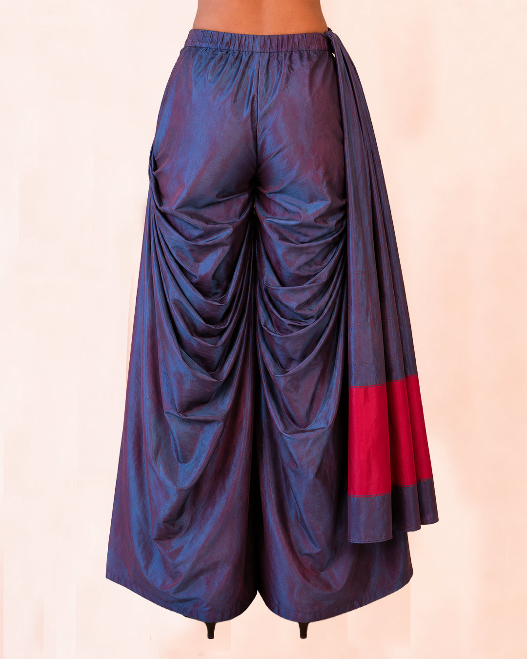 ANTARIYA XVIIII is a one of a kind drape pant, handcrafted in house from repurposed pure silk and saree borders.