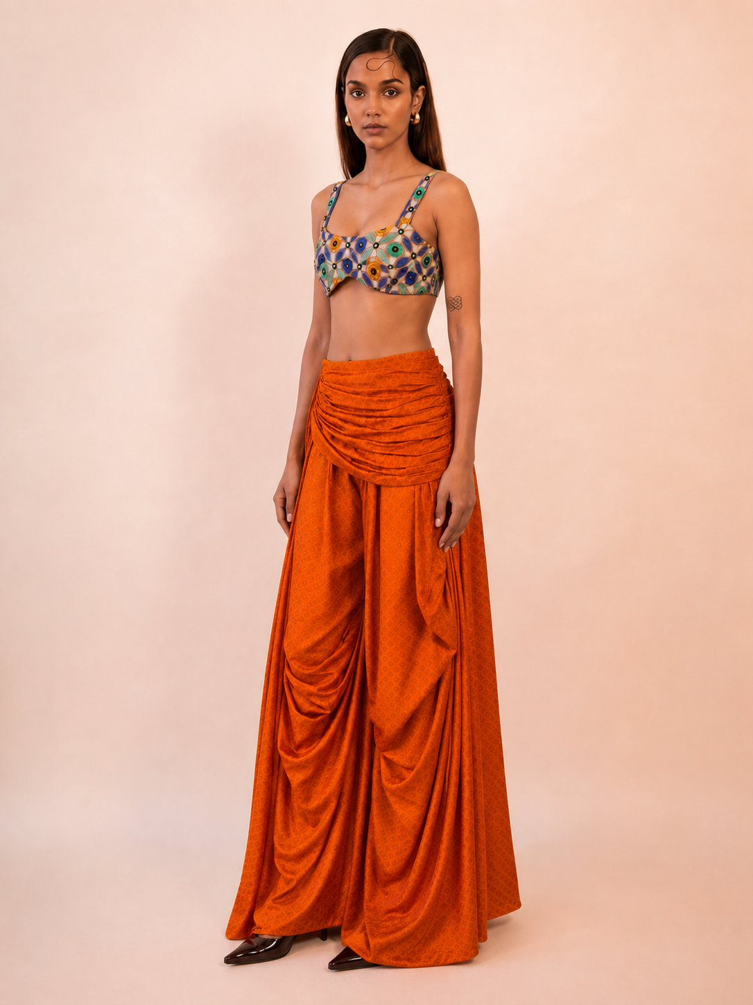 ANTARIYA XVI is a one of a kind drape pant, handcrafted in house from repurposed pure silk and saree borders.