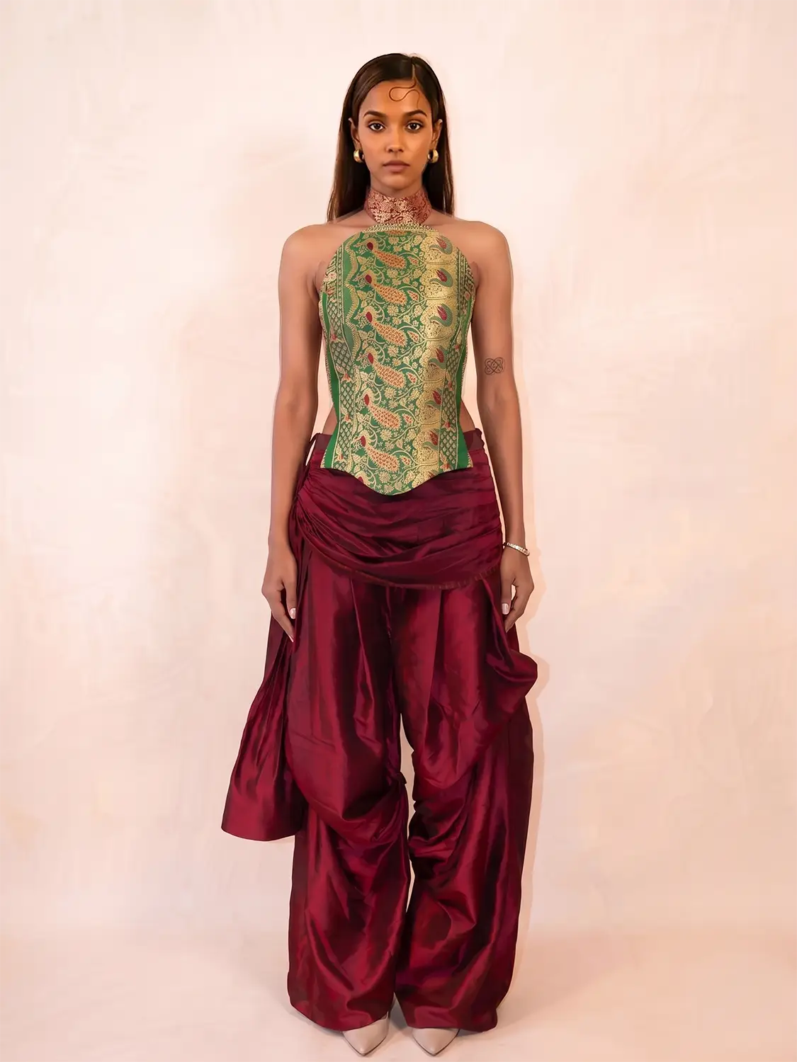 APSARA VIII.II is our high-neck, backless top crafted from a vintage silk saree, inhouse by skilled artisans. 