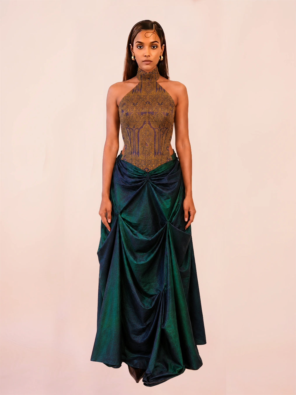 APSARA VIII is our high-neck, backless top crafted from a vintage silk saree, inhouse by skilled artisans. 