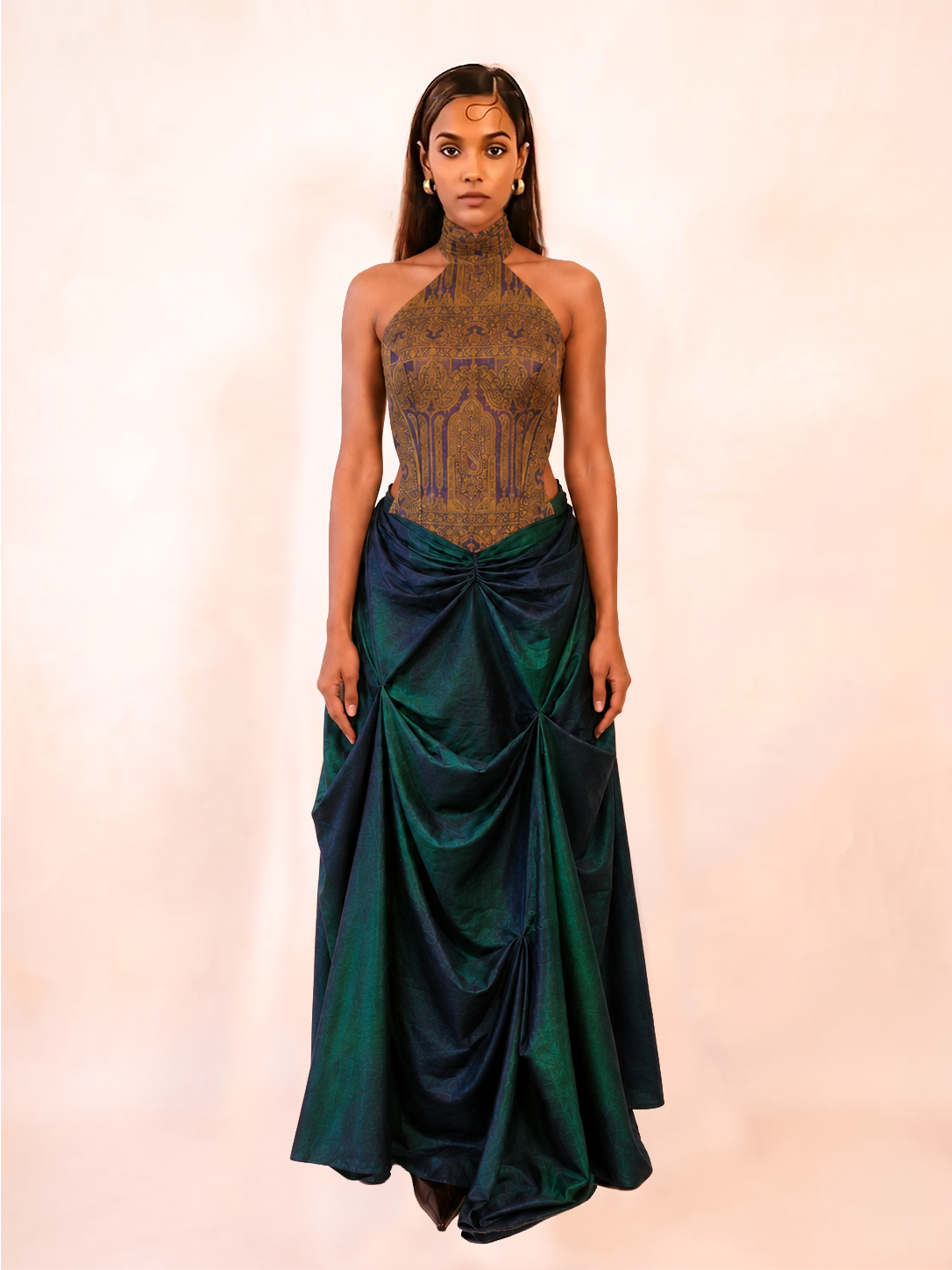 APSARA VIII is our high-neck, backless top crafted from a vintage silk saree, inhouse by skilled artisans. 