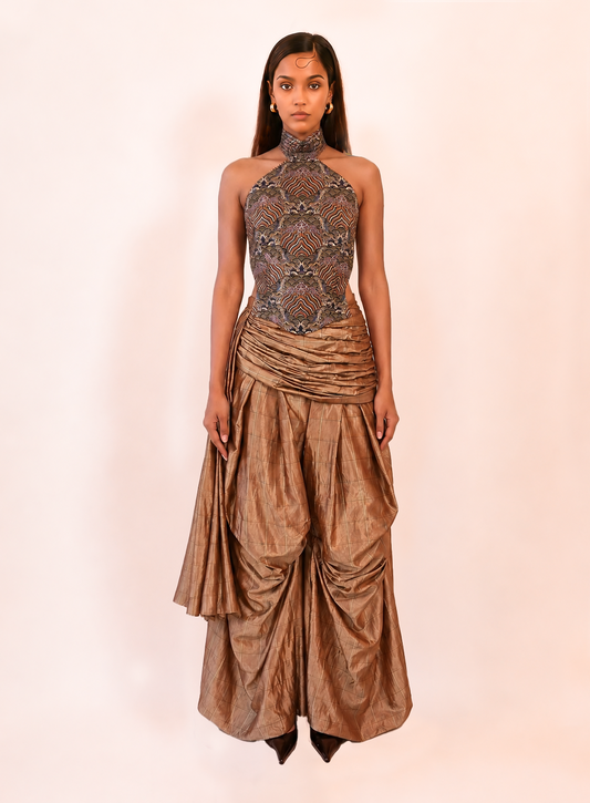 APSARA VI is our high-neck, backless top crafted from a vintage silk saree, inhouse by skilled artisans. 