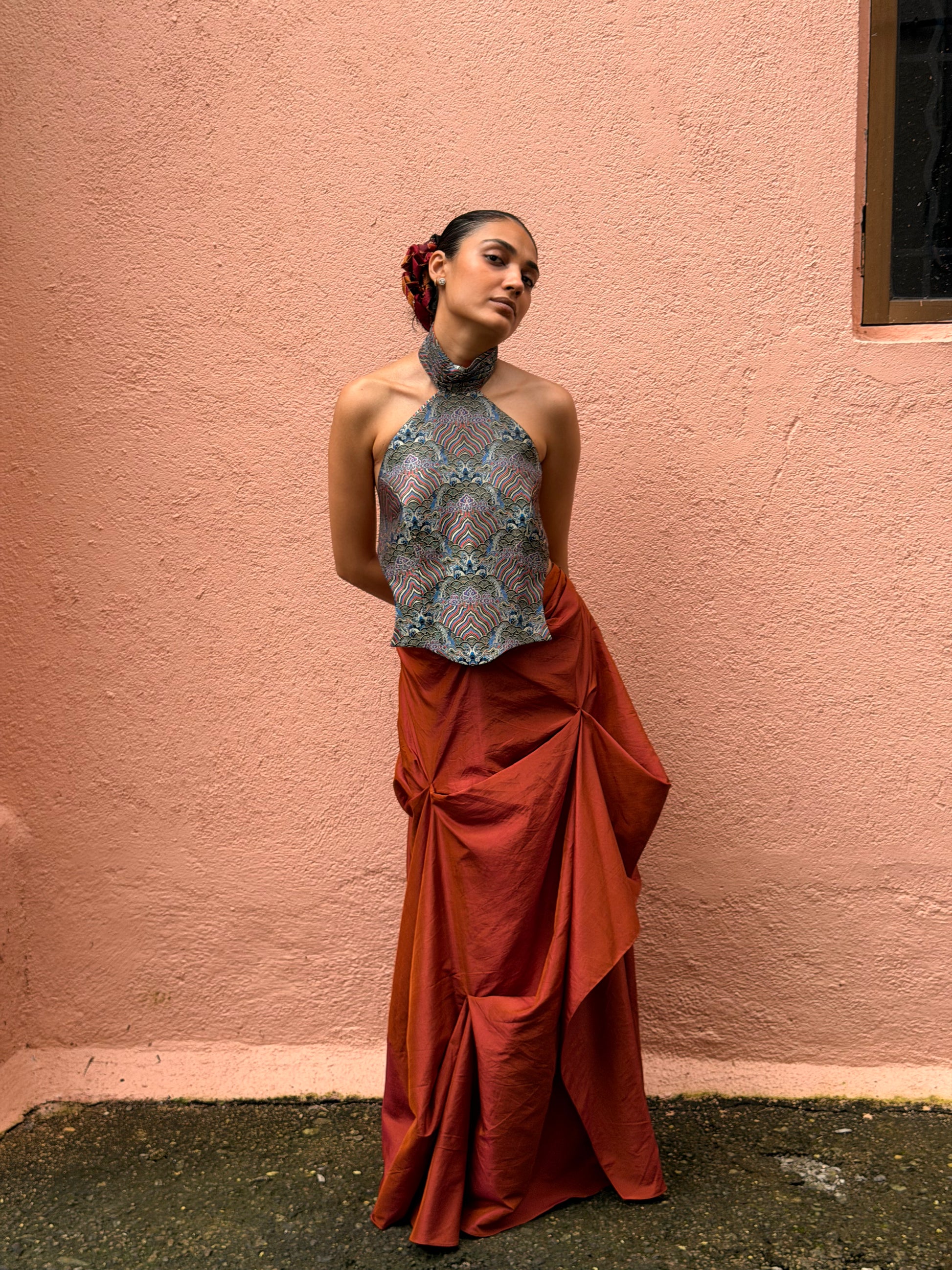 APSARA VI is our high-neck, backless top crafted from a vintage silk saree, inhouse by skilled artisans. 