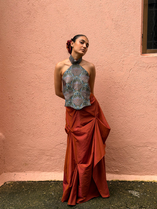 APSARA VI is our high-neck, backless top crafted from a vintage silk saree, inhouse by skilled artisans. 