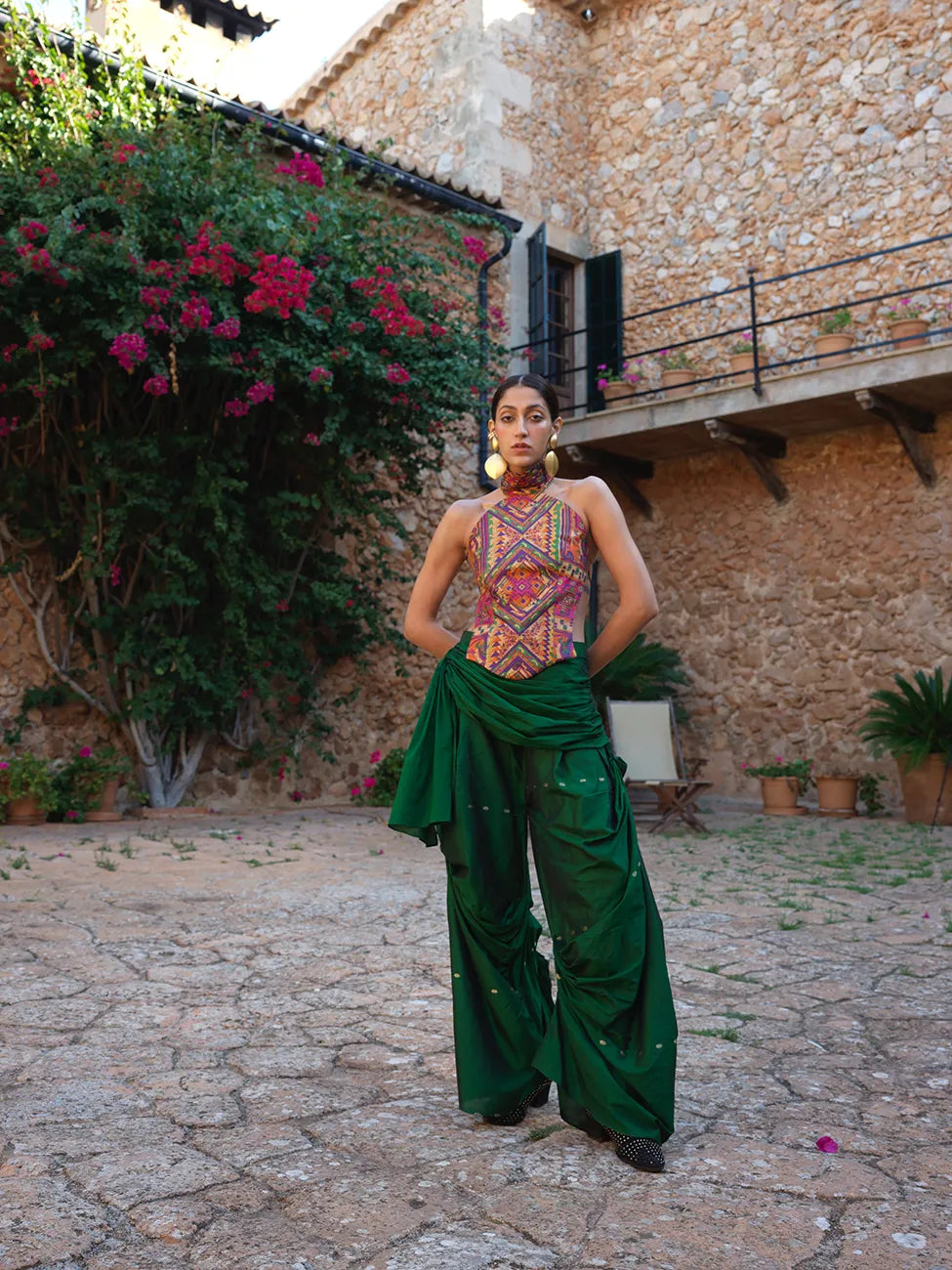 Apsara is our high-neck, backless top crafted from a vintage silk saree, inhouse by skilled artisans. 