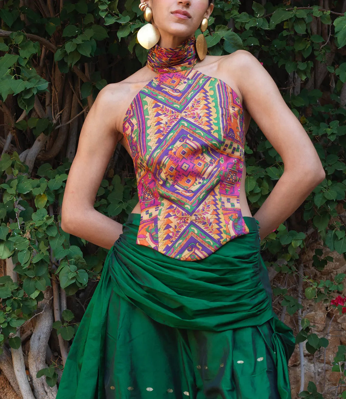 Apsara is our high-neck, backless top crafted from a vintage silk saree, inhouse by skilled artisans. 