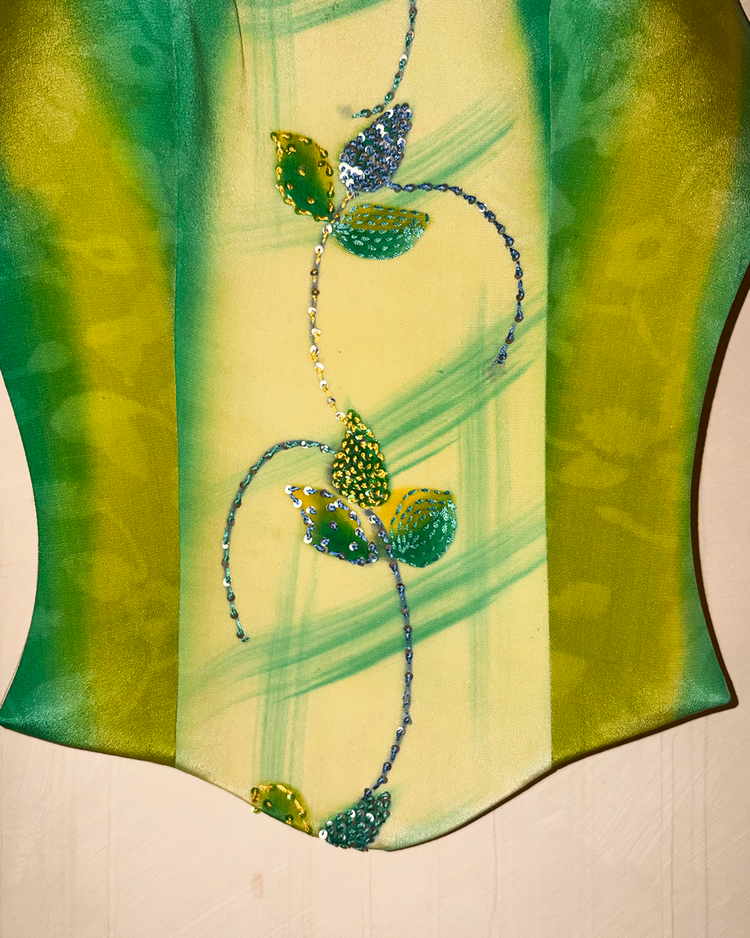 APSARA is our high-neck, backless top crafted from a vintage silk saree, inhouse by skilled artisans. 
