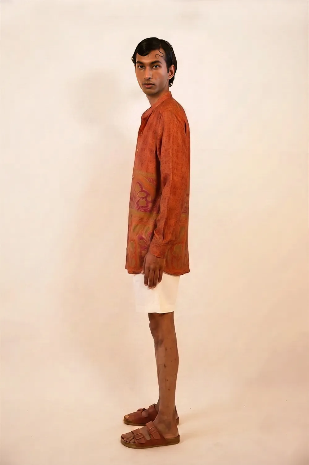 ATHARV Shirt is a one of a kind piece, handcrafted in house from orange printed pure silk.