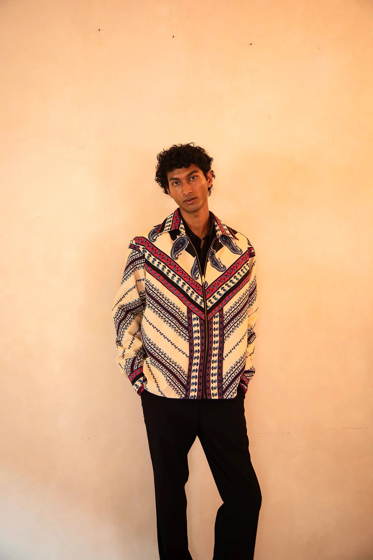 Aksa Bomber IV is our one-of-a-kind printed silk bomber jacket, handcrafted by skilled artisans in-house using a one-of-a-kind vintage silk saree.
