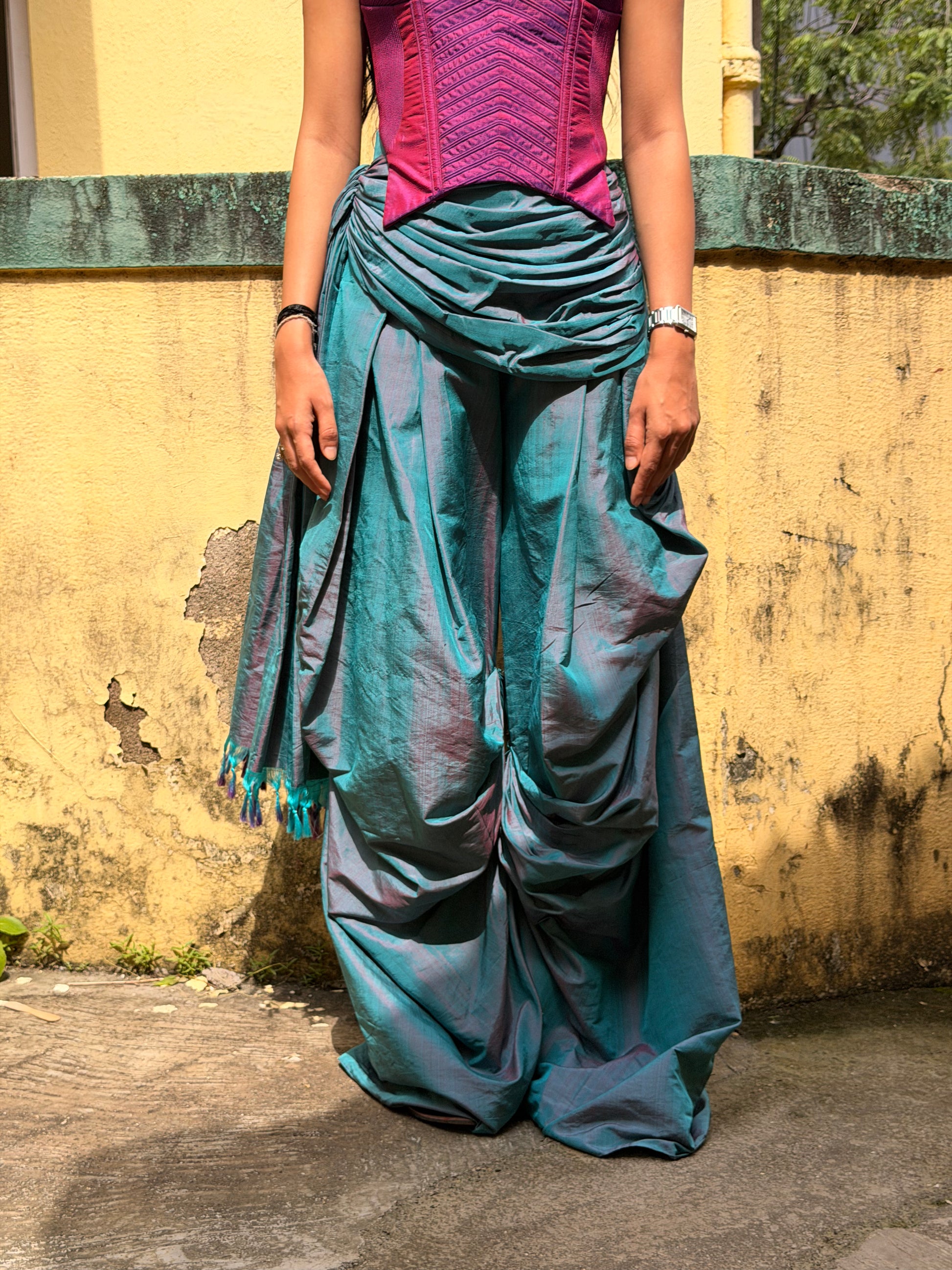 Antariya is a one of a kind drape pant, handcrafted in house from repurposed pure silk and saree borders. 