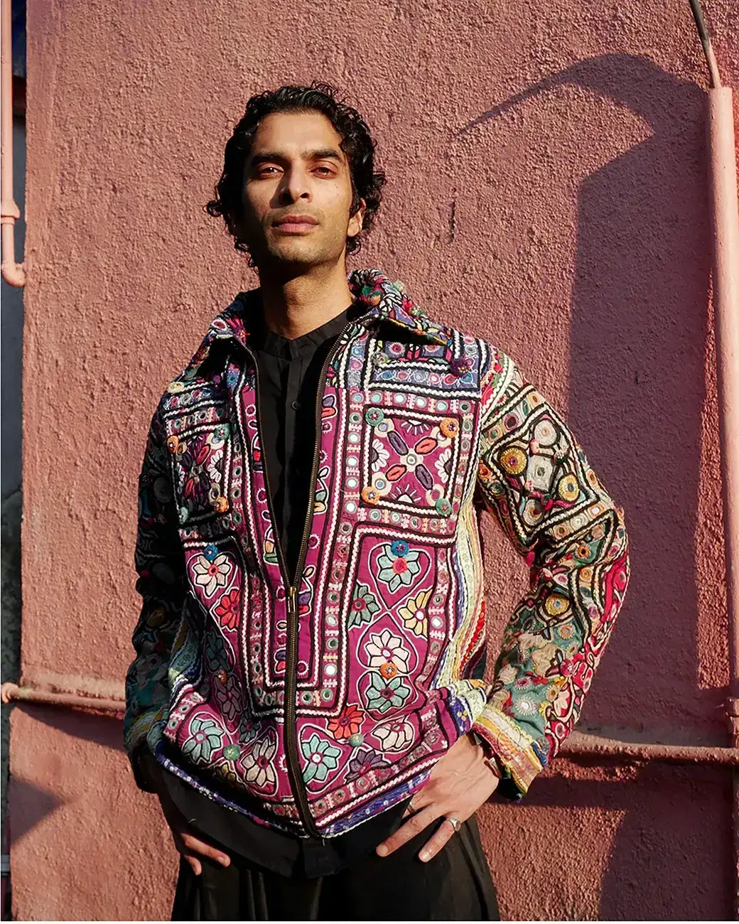 One-of-a-kind jacket handcrafted from traditional Rabari cholas panelled together, lined with a vintage silk sari, featuring a boxy fit with dropped shoulders.