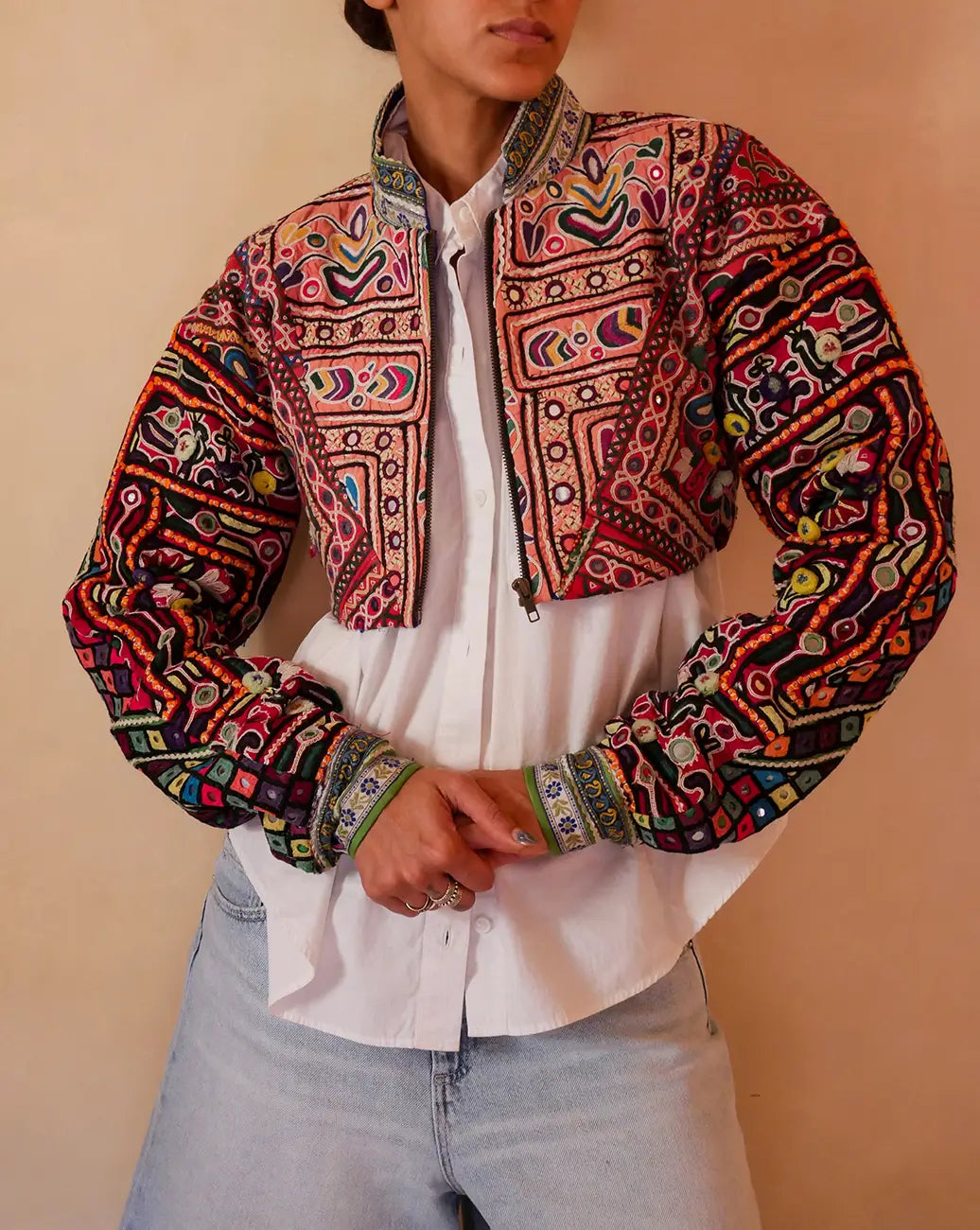 Cropped Chola Jacket III handcrafted from Rabari cholas with vintage silk sari lining, dropped shoulders and relaxed fit.