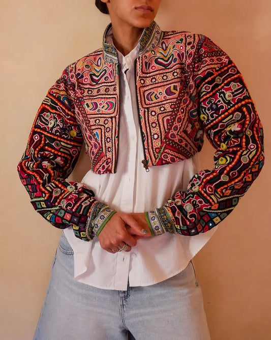 Cropped Chola Jacket III handcrafted from Rabari cholas with vintage silk sari lining, dropped shoulders and relaxed fit.