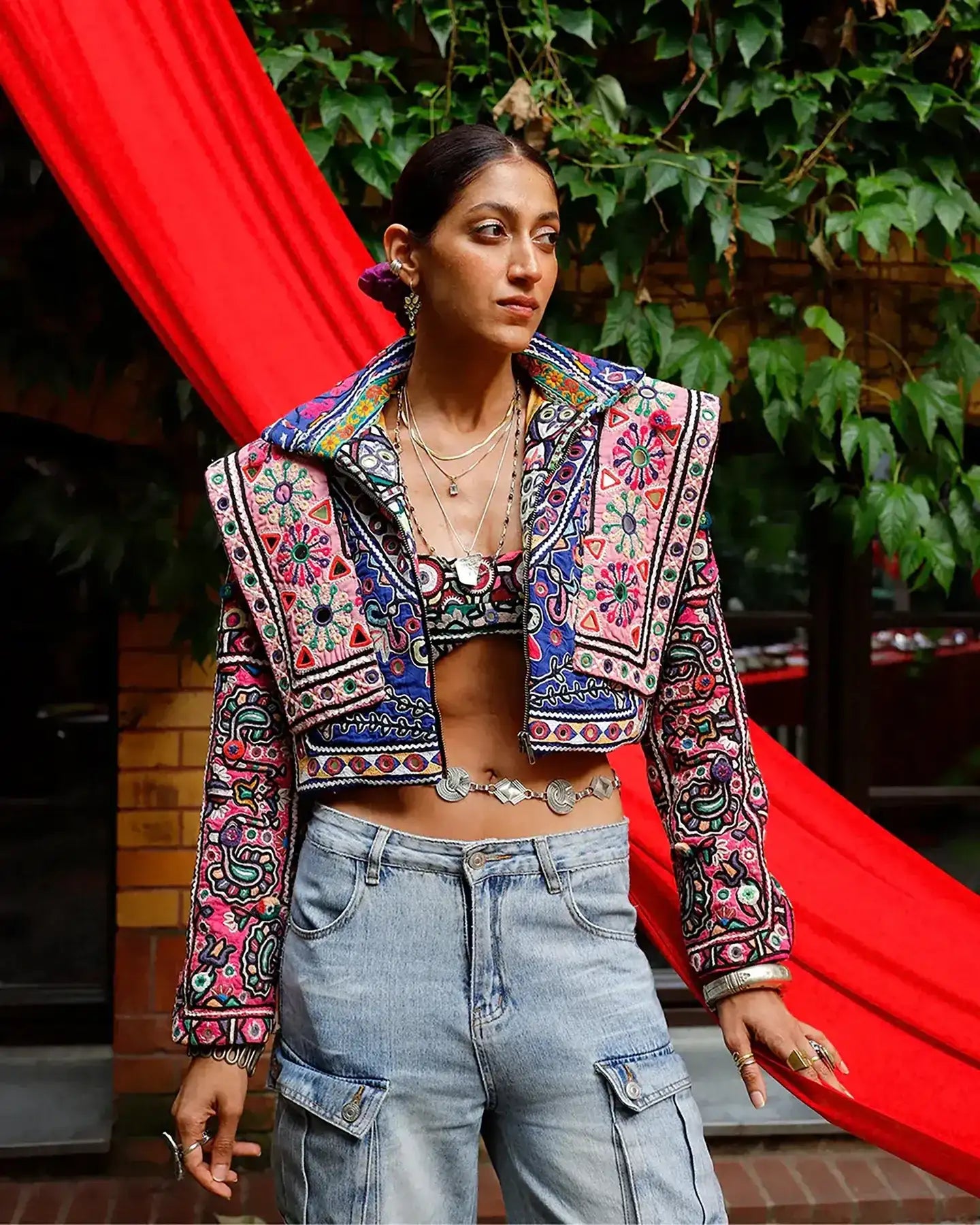 Chola No. II hand-embroidered jacket made from vintage Rabari Cholis with intricate threadwork, mirror detailing, and bold motifs in a contemporary silhouette.