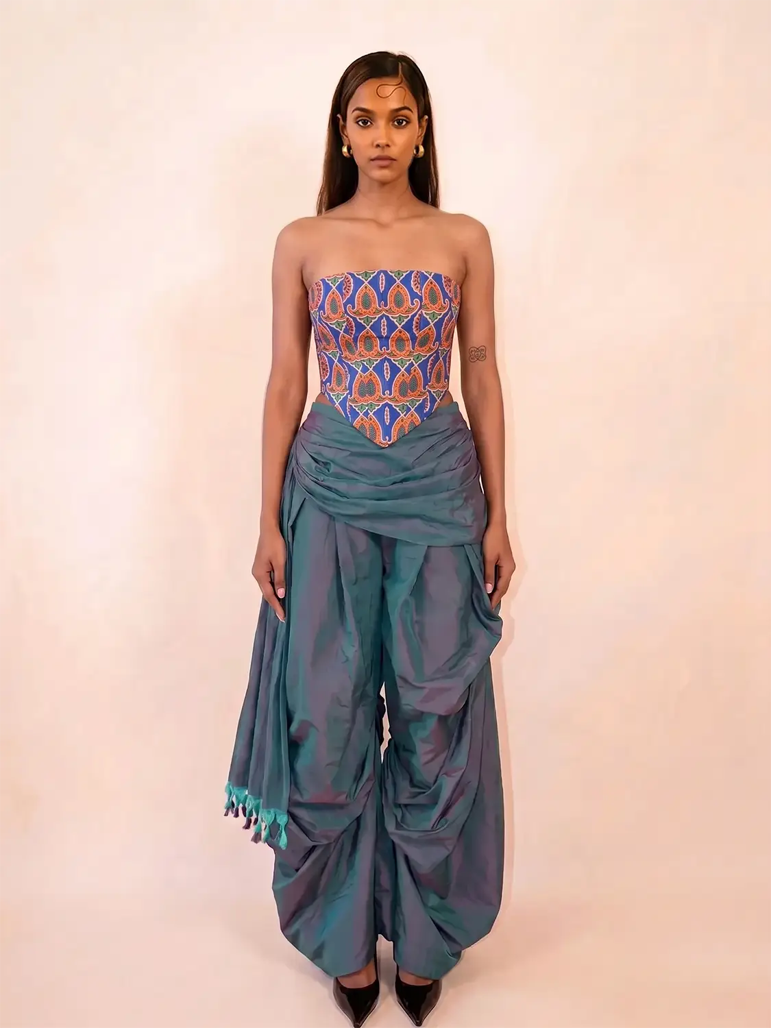 FALAK is our one-of-a-kind printed silk tube corset, handcrafted by skilled artisans in-house using a one-of-a-kind vintage silk saree.