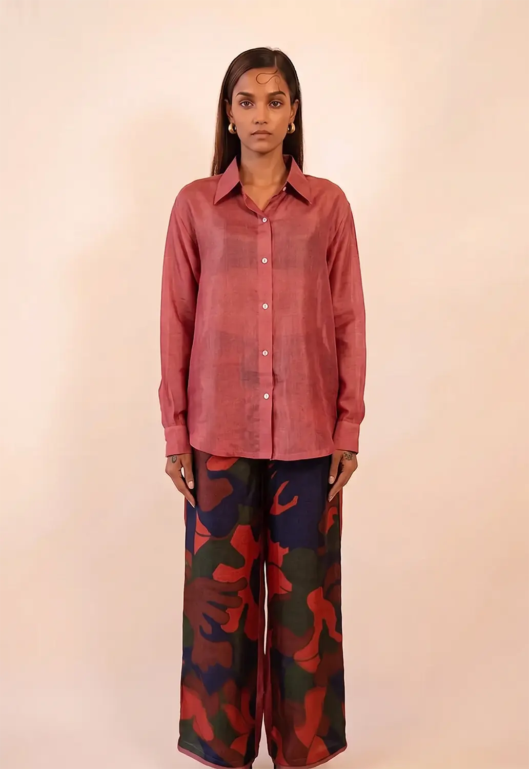 A relaxed co-ord set featuring a simple silk shirt, Designed for effortless wear
