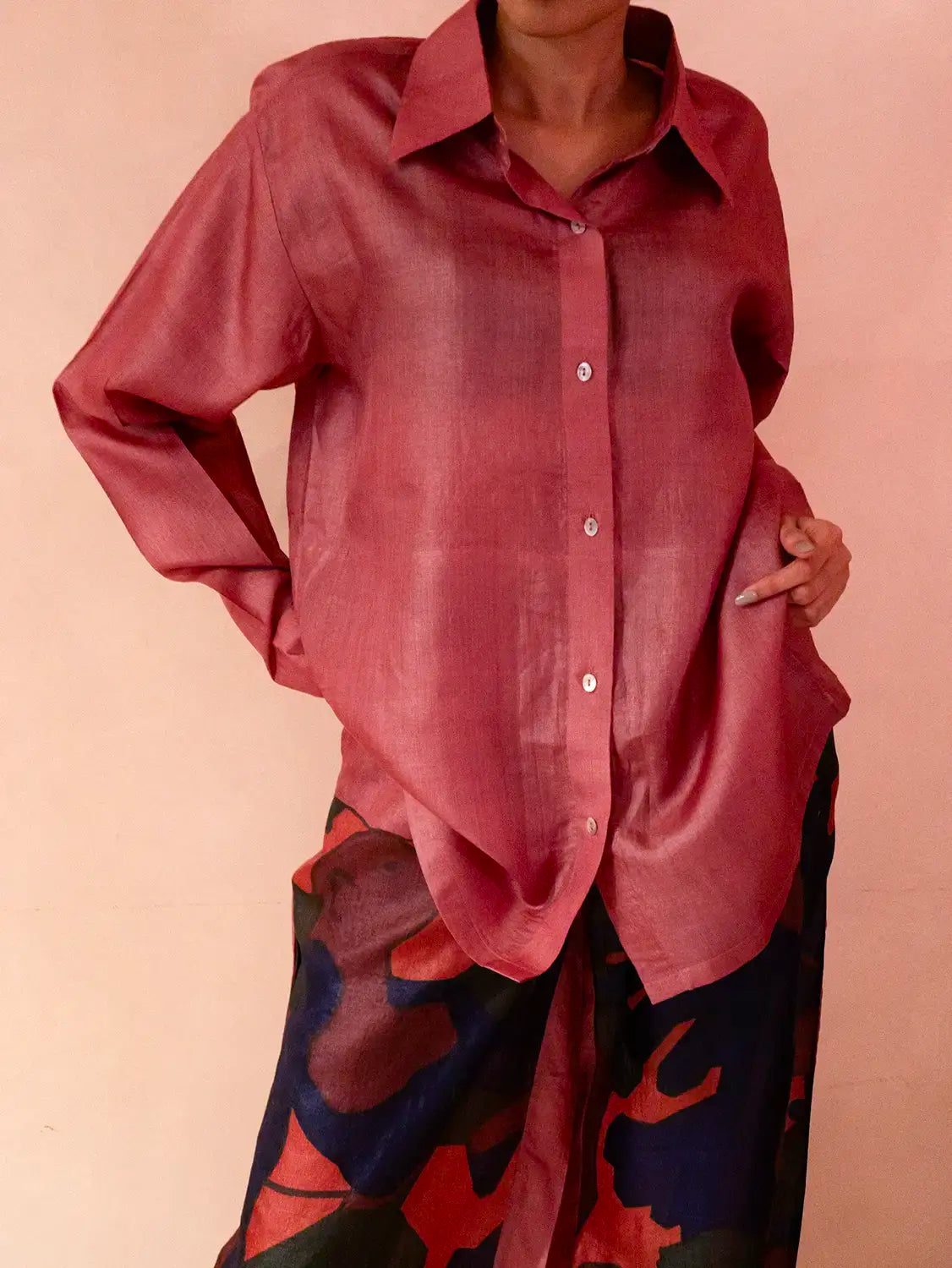A relaxed co-ord set featuring a simple silk shirt, Designed for effortless wear