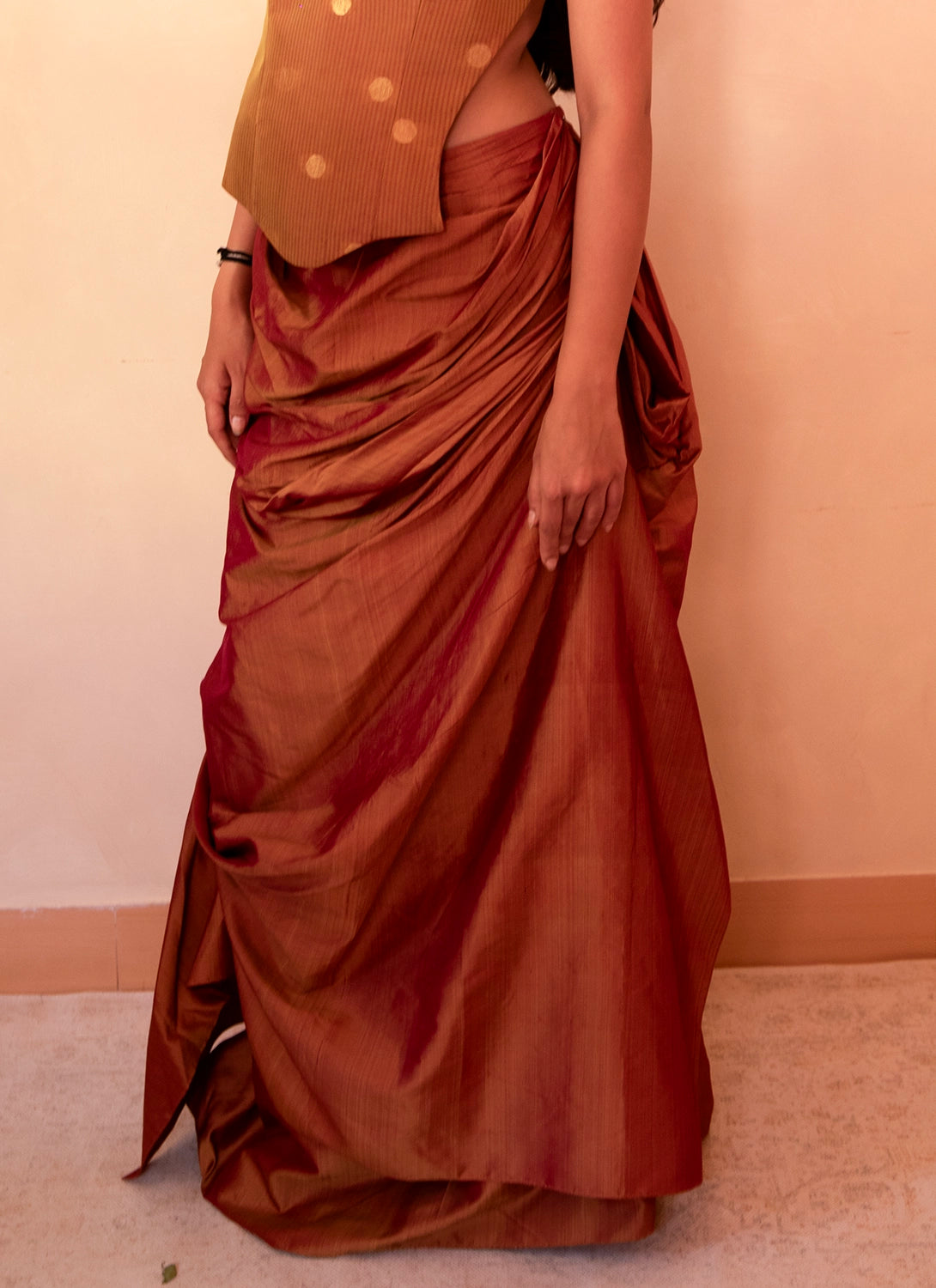 GULJHAAM V is a one of a kind drape skirt, crafted in house from a vintage silk saree