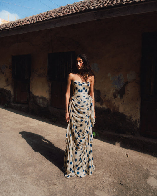 INDIGO GULJHAAM is a one of a kind drape skirt, crafted in house from a vintage silk saree and shaped through intuitive, sculptural draping.