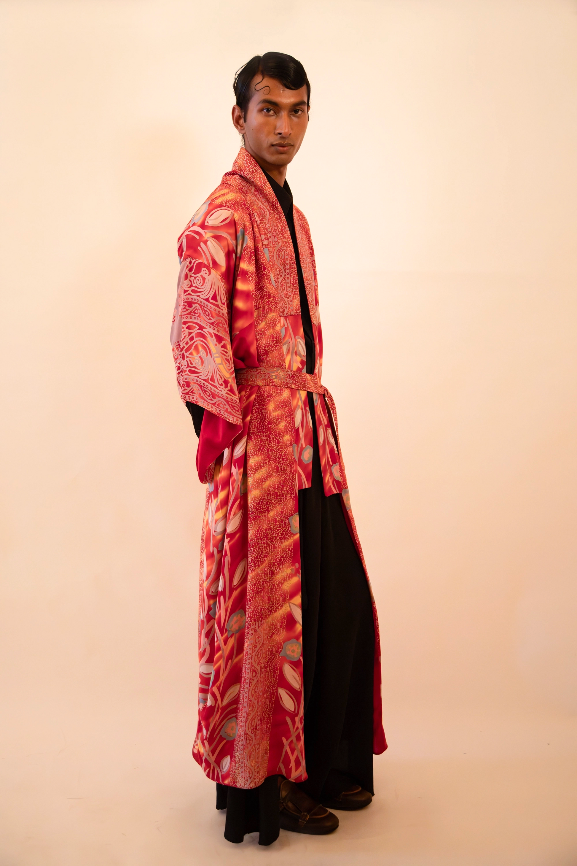 Lalita is our one-of-a-kind red printed silk kimono, handcrafted by skilled artisans in-house using a vintage silk sari.