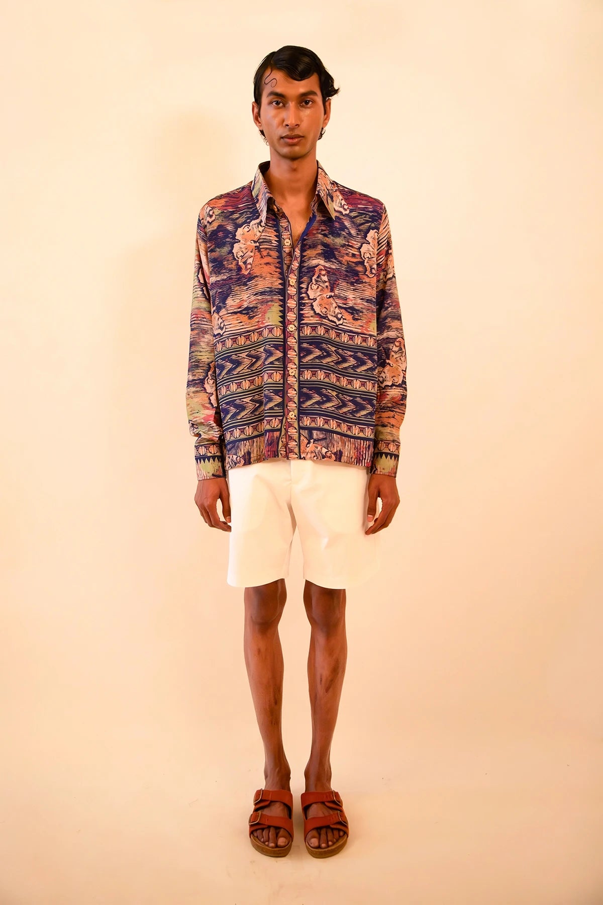LAVYA is a one-of-a-kind full-sleeve shirt, crafted from vintage fabric in a bold multicolour butterfly print.