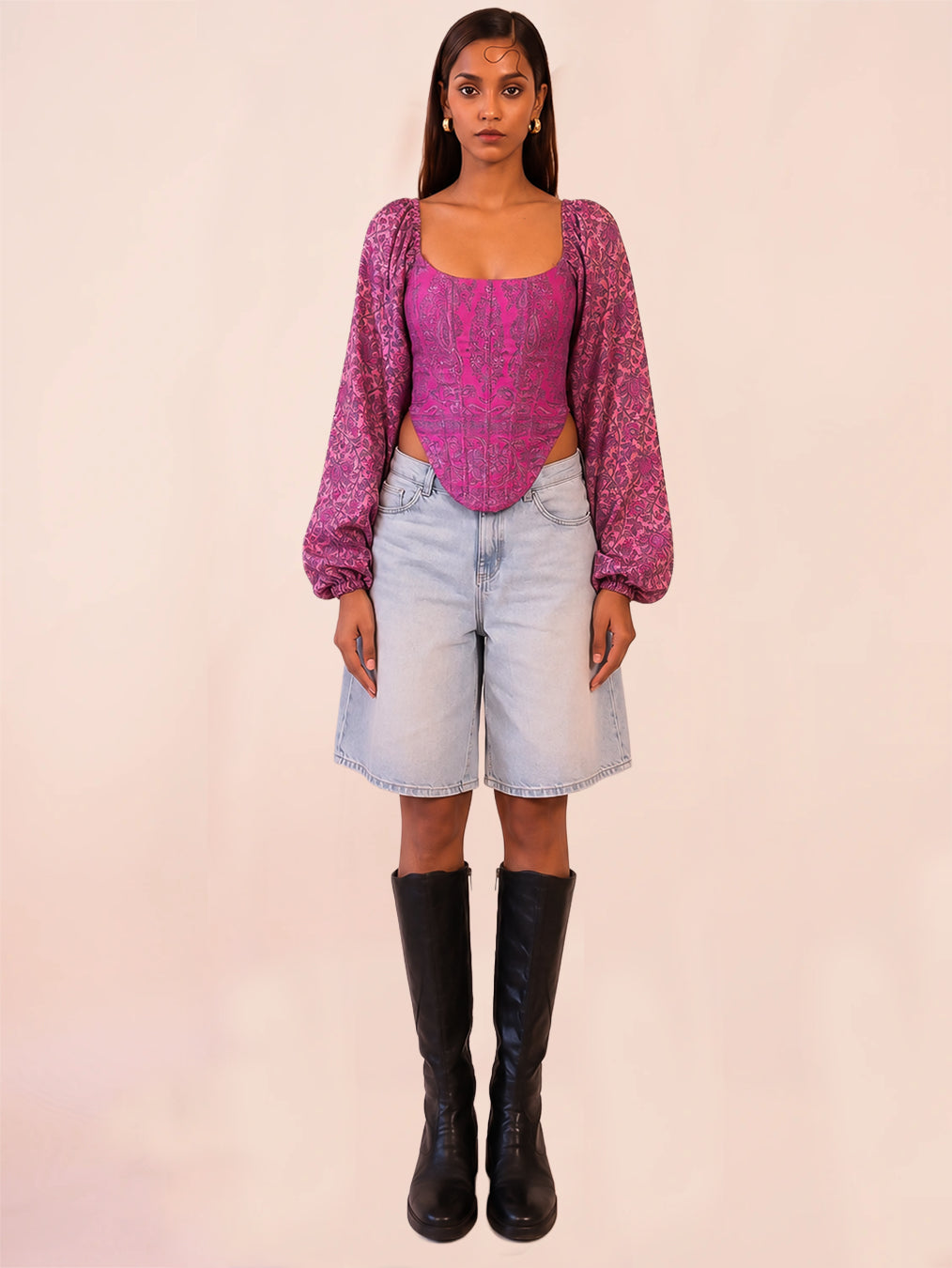 NAMYA is a one of a kind corset with sleeves, handcrafted in house from a vintage printed pure silk saree.