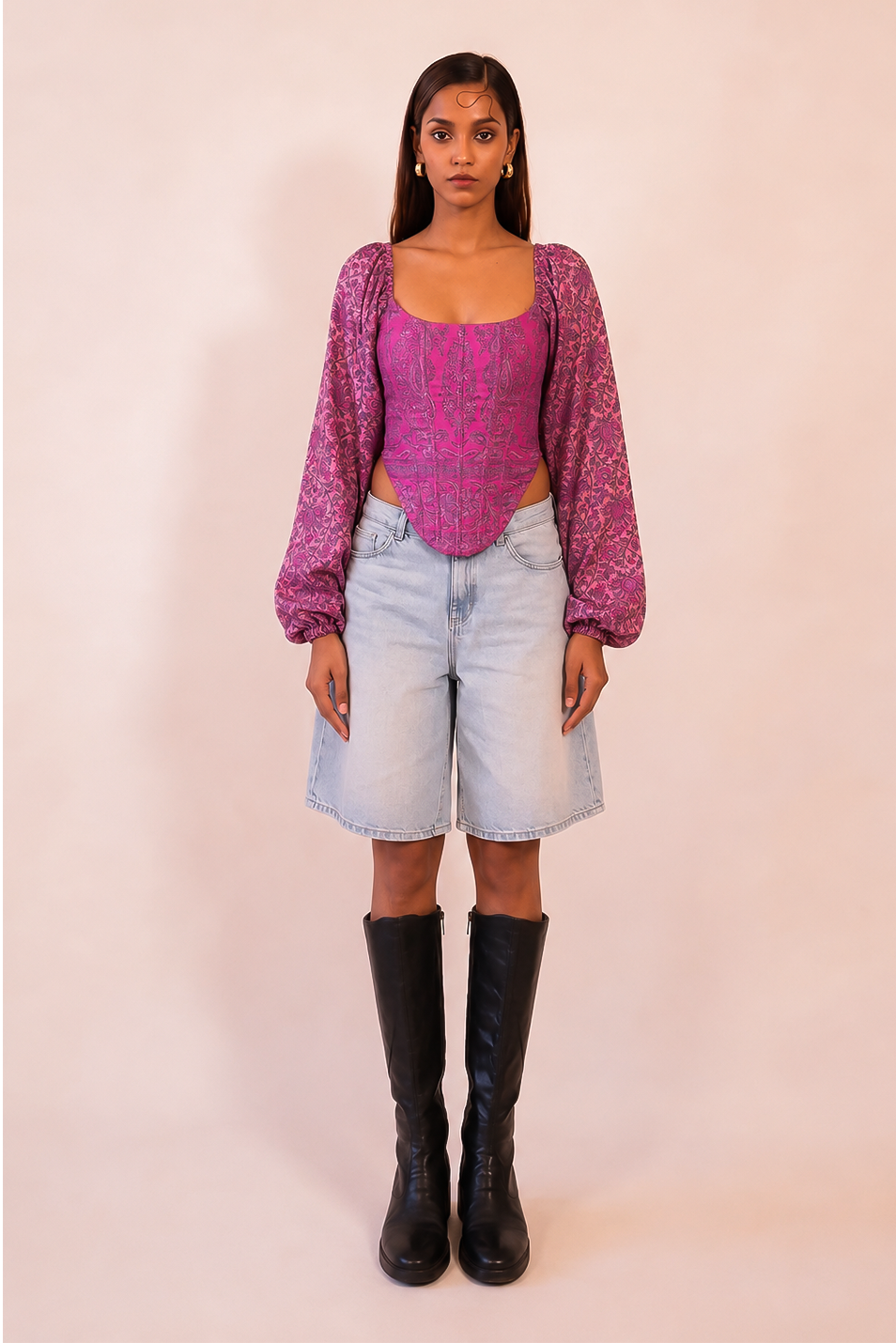 NAMYA is a one of a kind corset with sleeves, handcrafted in house from a vintage printed pure silk saree. 