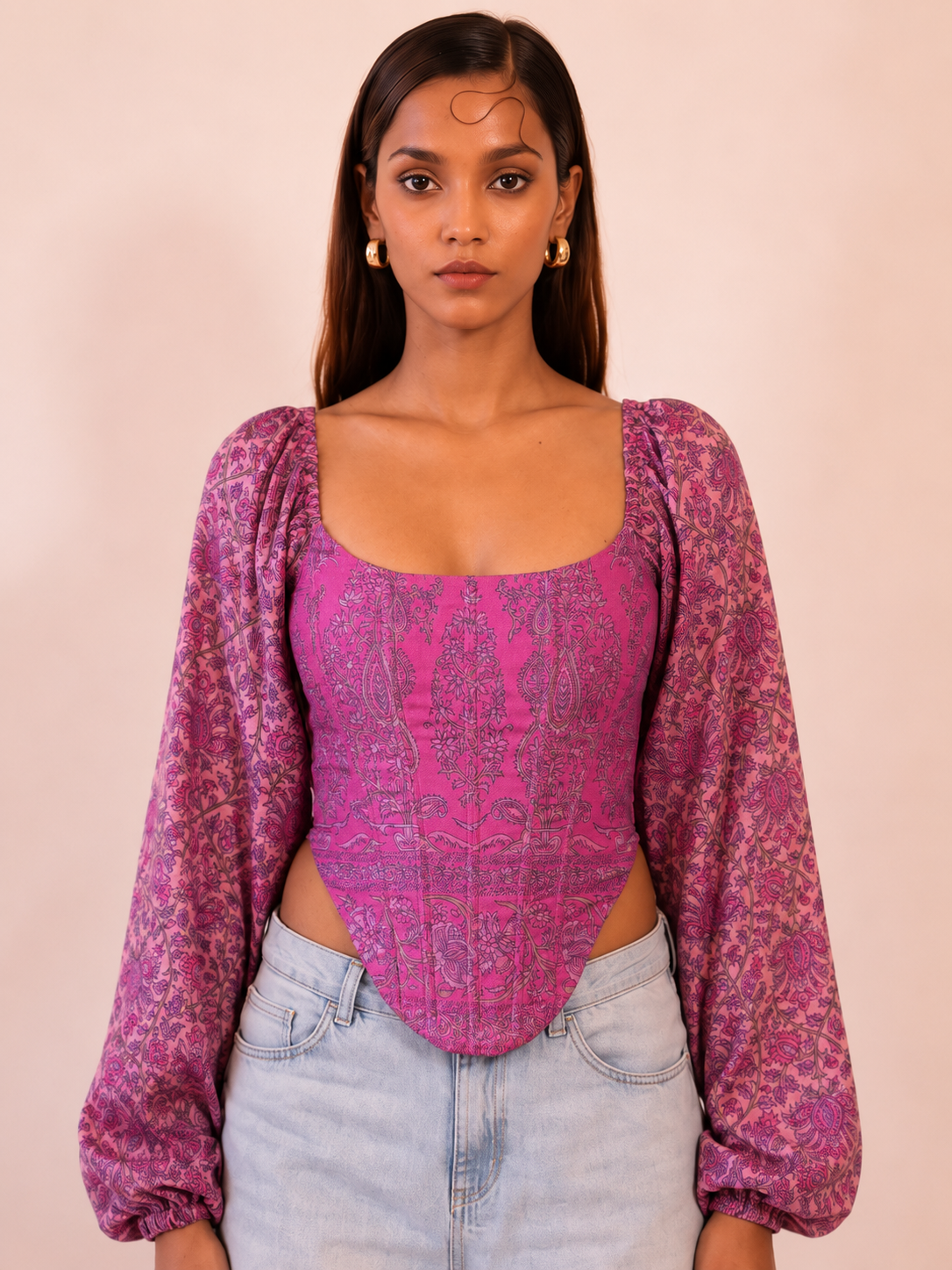 NAMYA is a one of a kind corset with sleeves, handcrafted in house from a vintage printed pure silk saree. 